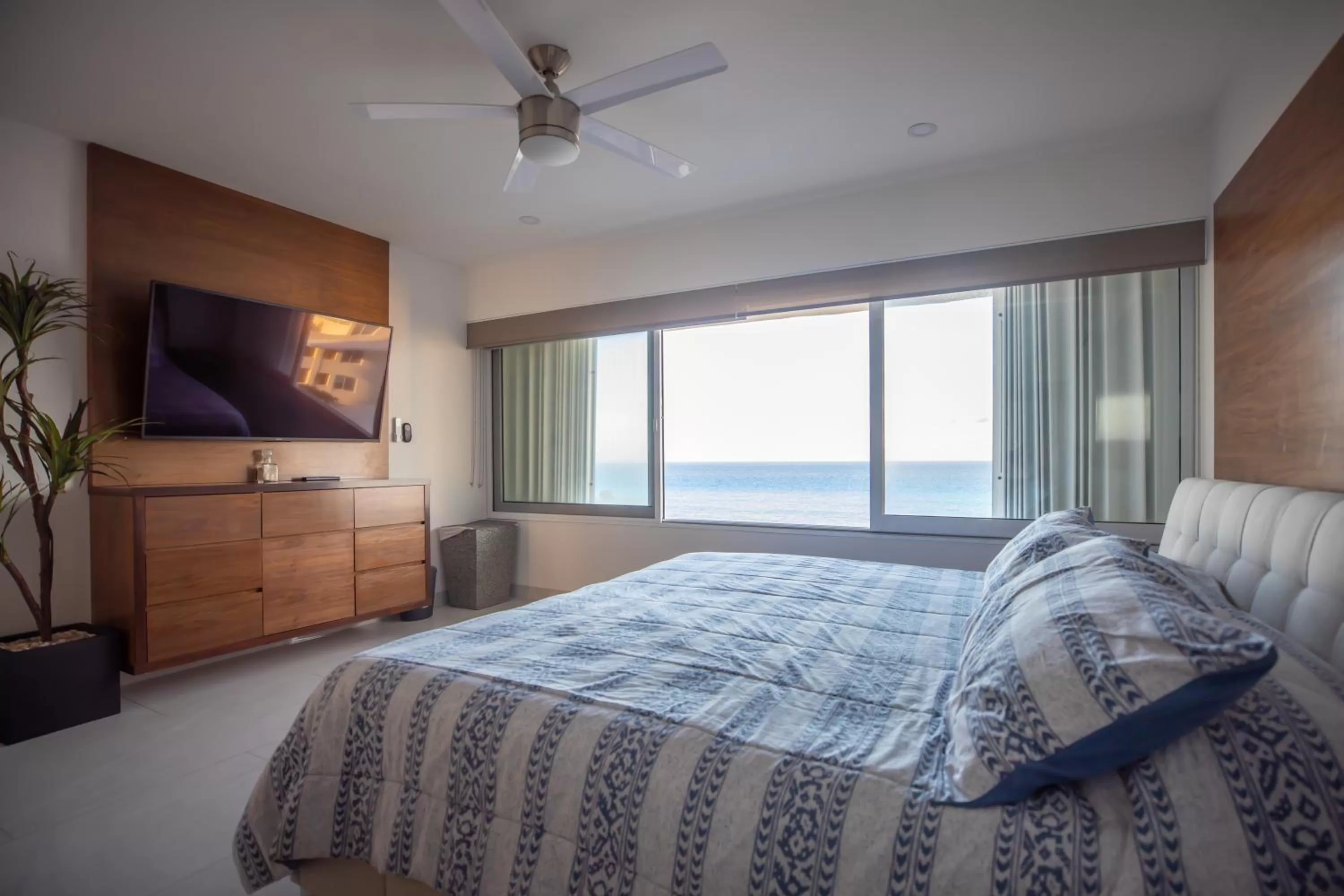 Bed in Beachfront Penthouses by LivIN Cancun
