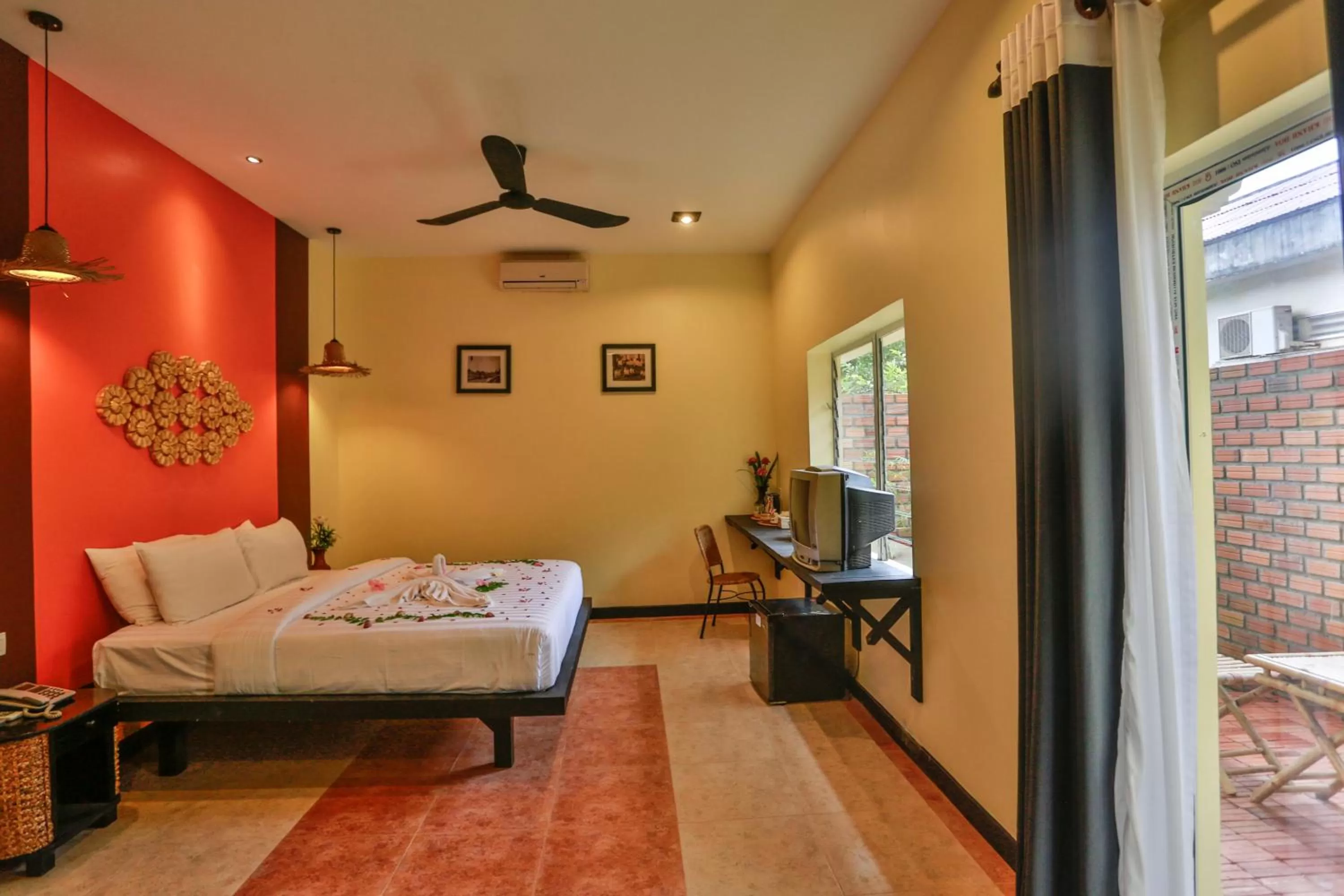 Bed in Home Indochine d'Angkor Hotel