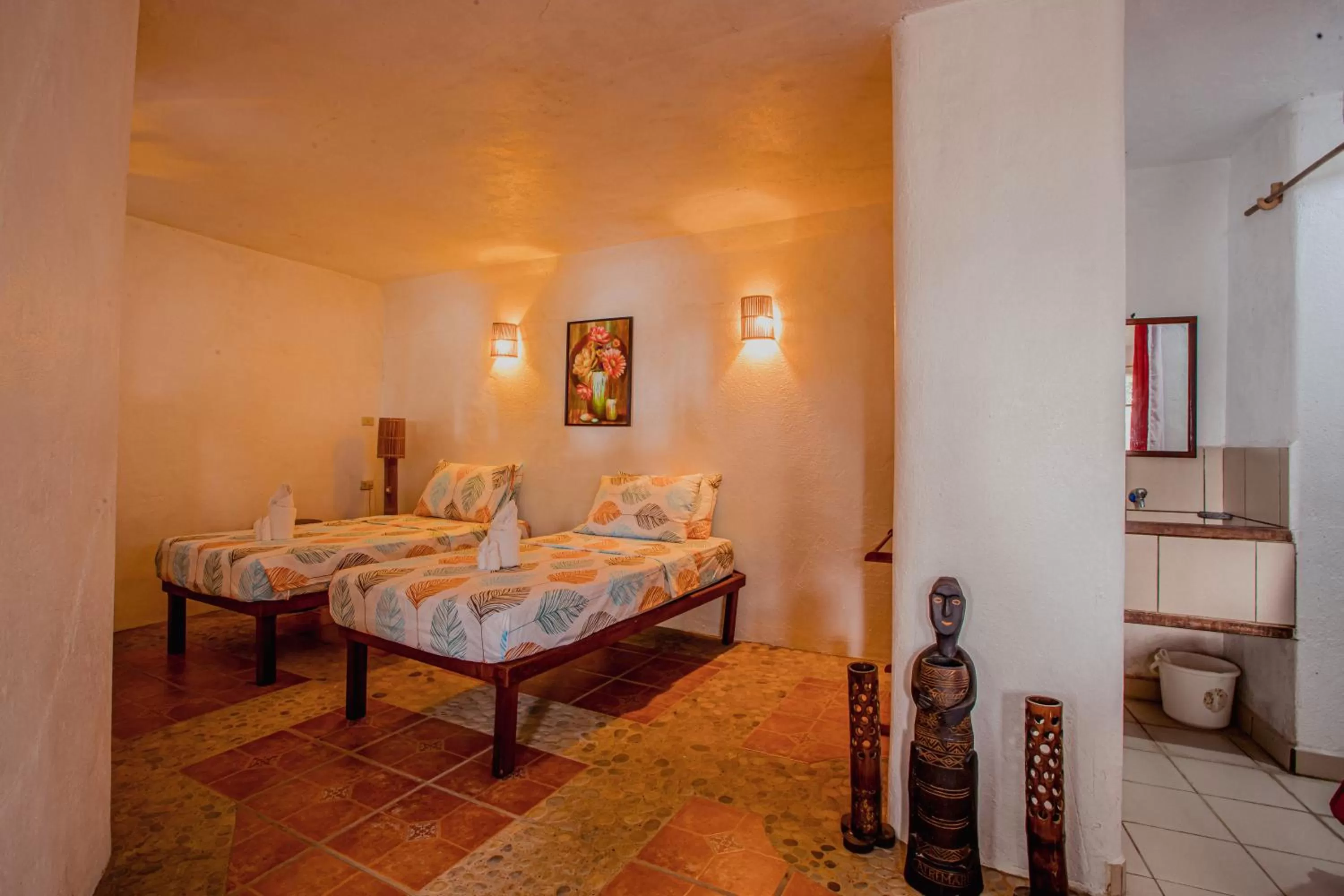 Bed in Atremaru Jungle Retreat