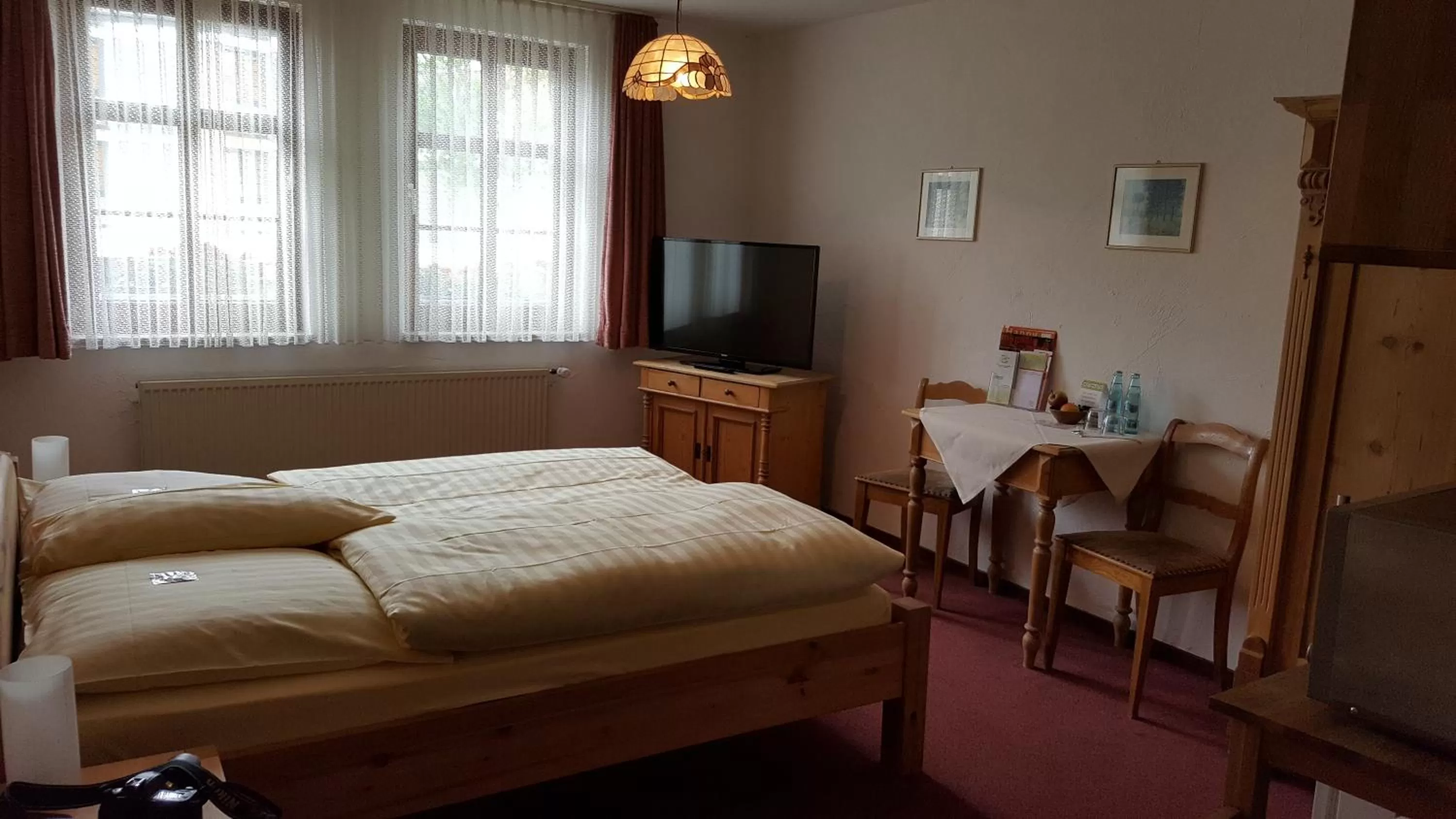 Photo of the whole room, Bed in Hotel Goldflair am Rathaus