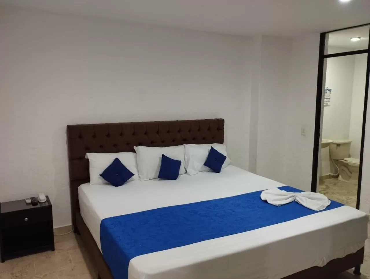 Bed in Blue Star Hotel