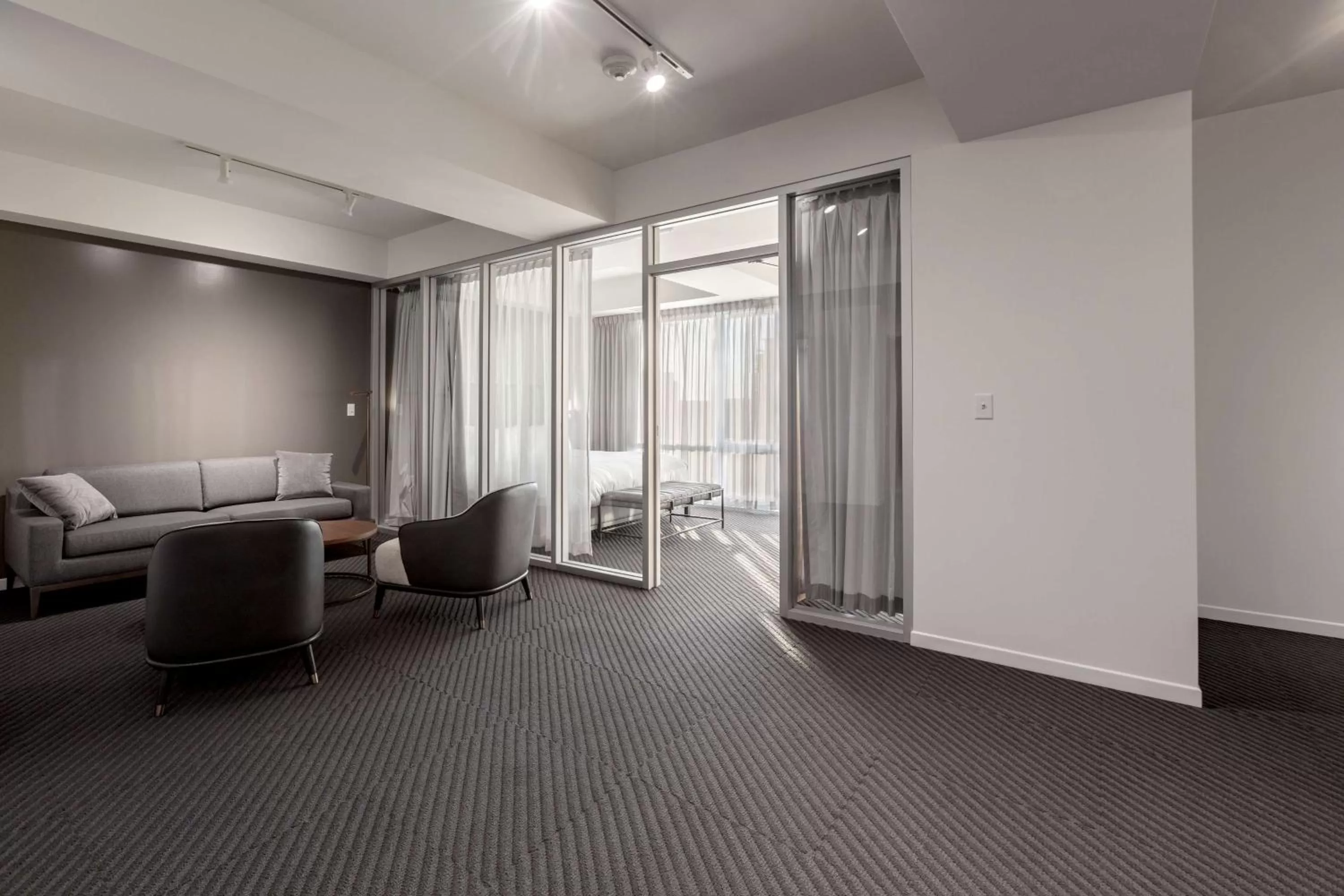 Living room in Hotel Chauncey Iowa City, Tapestry Collection by Hilton