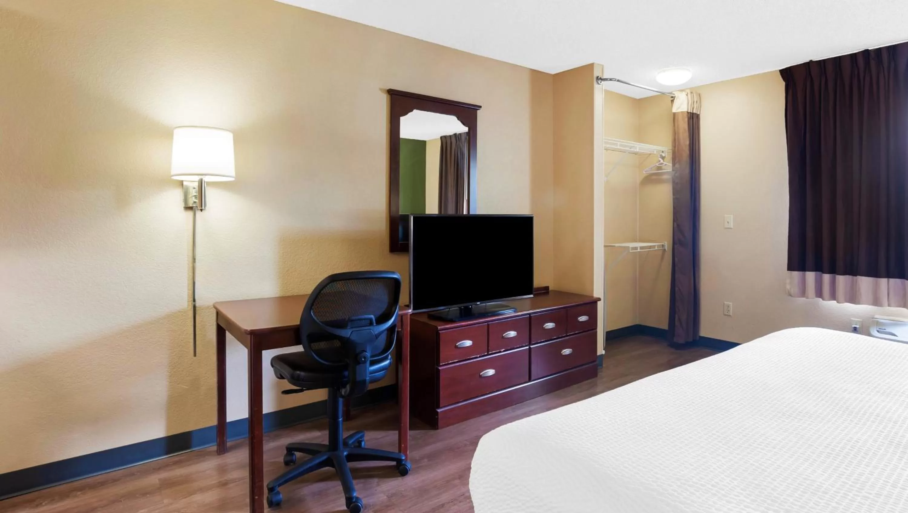 Bedroom, Bed in Home 1 Suites Extended Stay