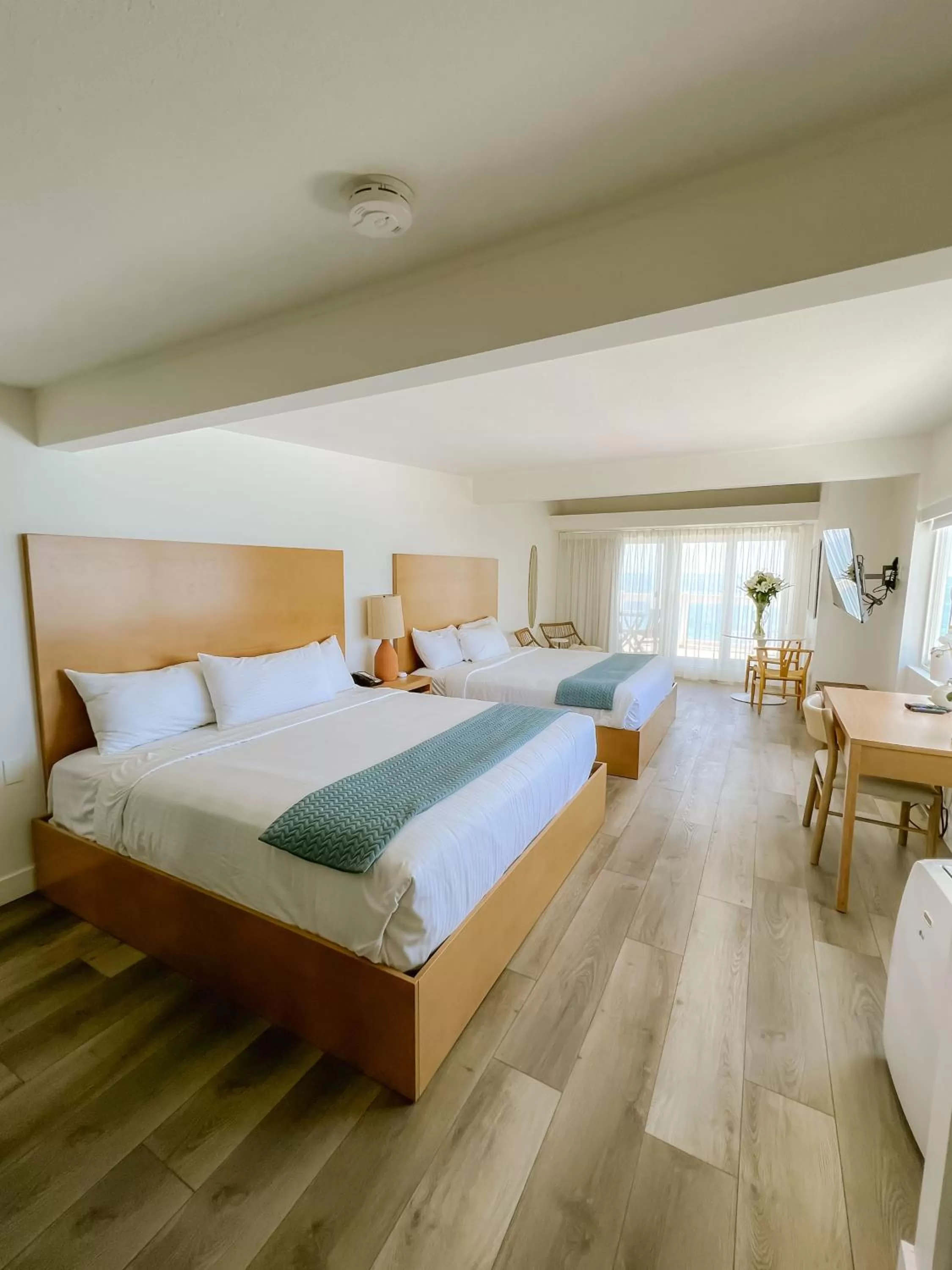 Bed in Capri Laguna on the Beach - A Boutique Hotel