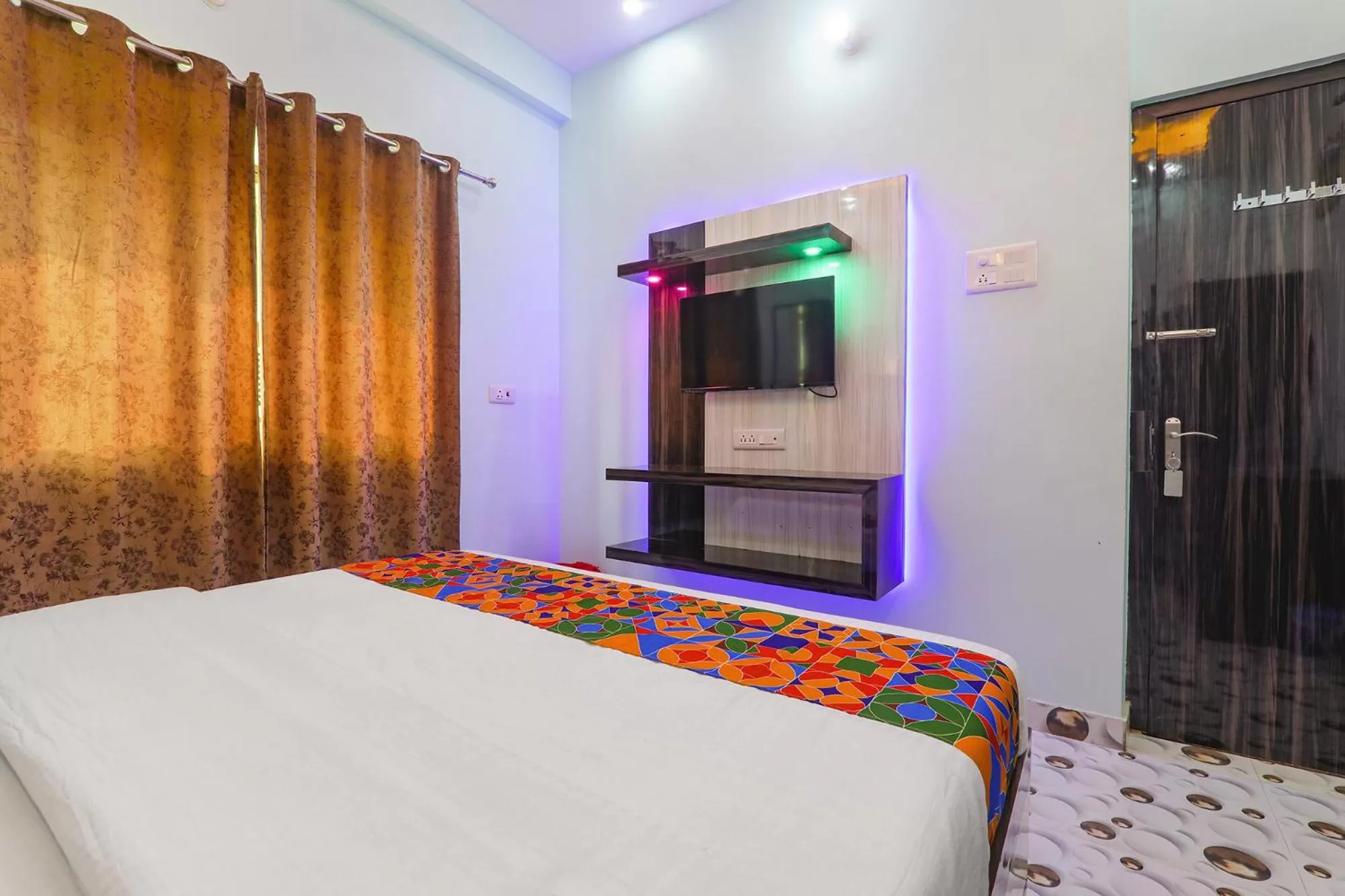 Bed in FabHotel Lumbini International