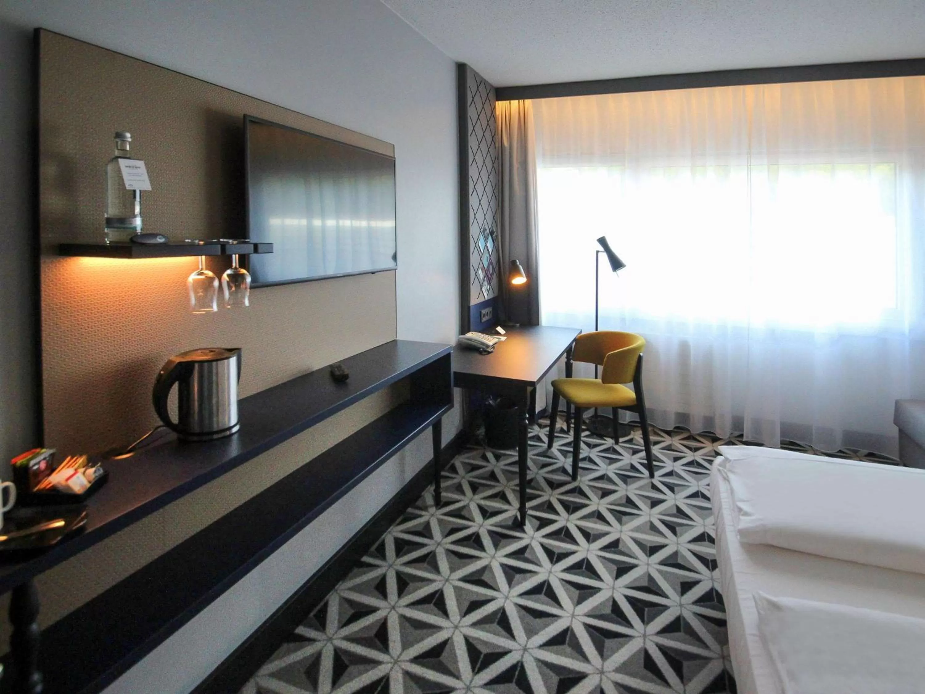 Standard Room with Double and Armchair Bed in Mercure Hotel Freiburg am Münster