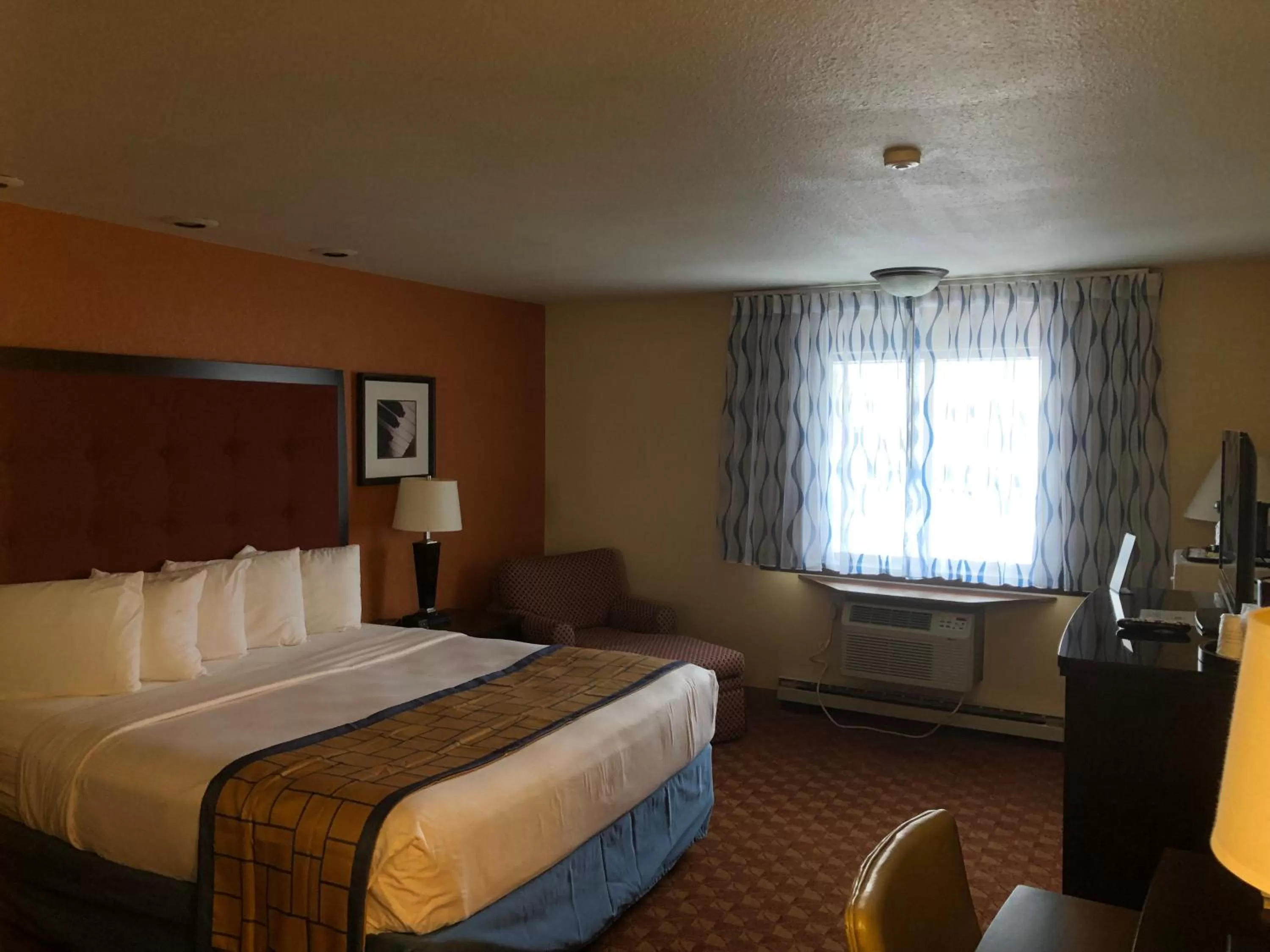 Bedroom, Bed in Days Inn & Suites by Wyndham Stevens Point