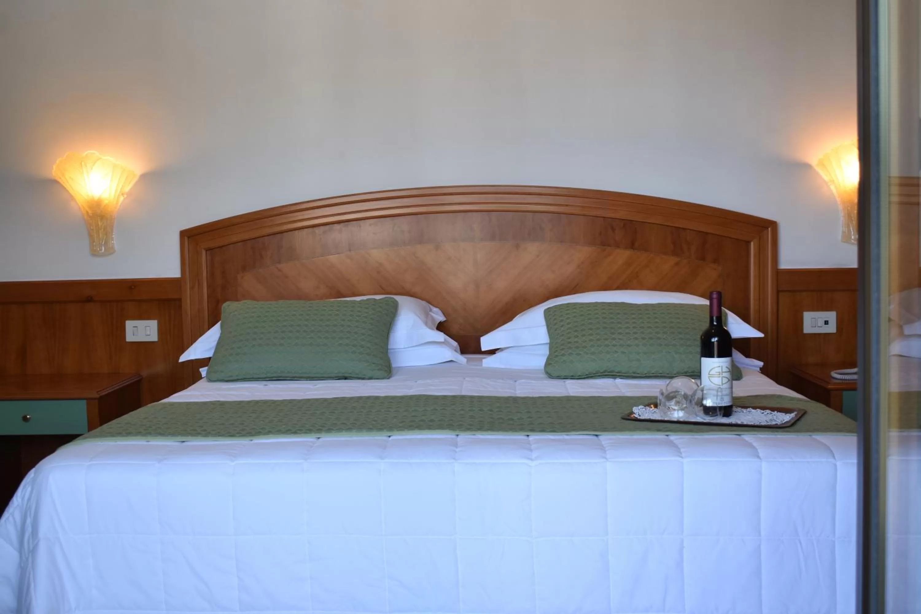 Bed in Grand Hotel Cesare Augusto