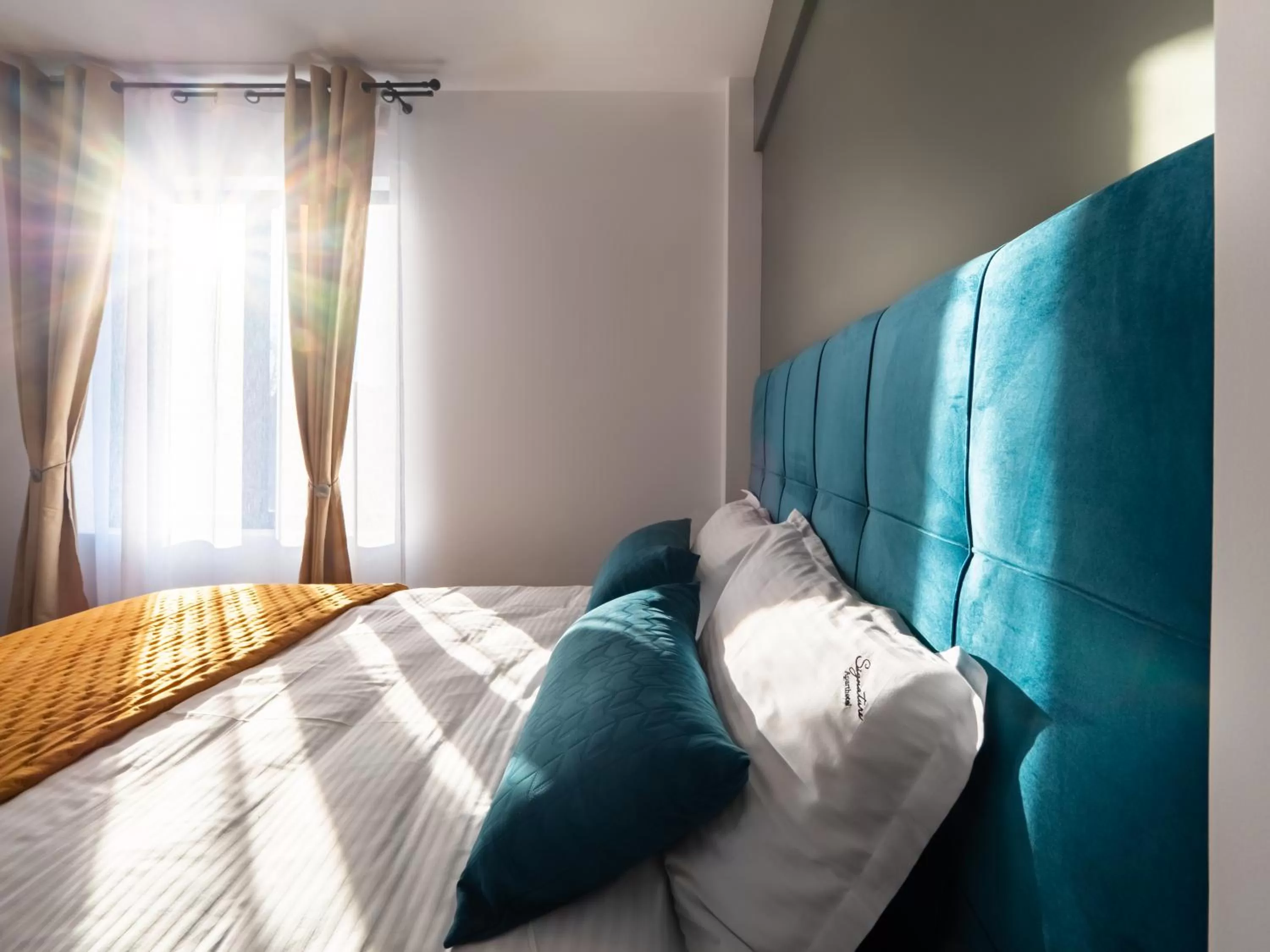 Bed in Signature Aparthotel - Boutique