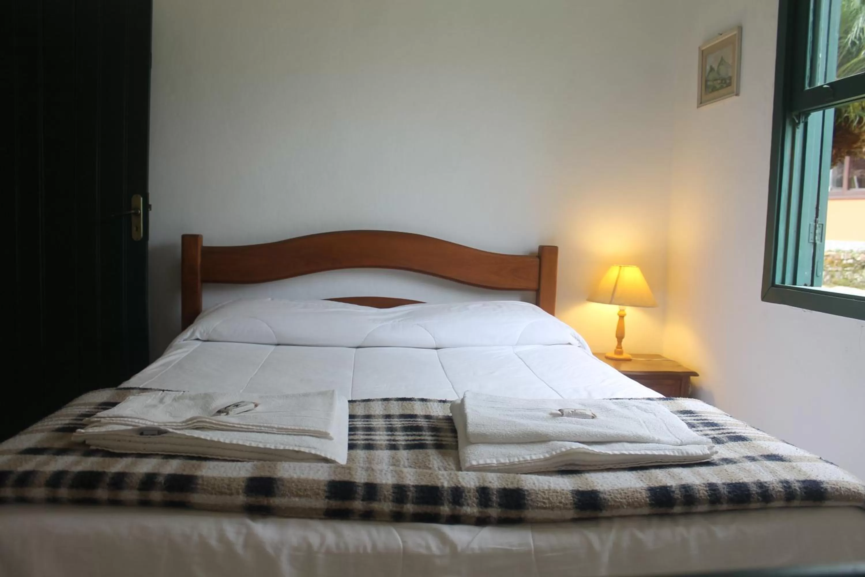 Bed in Pousada Mariza