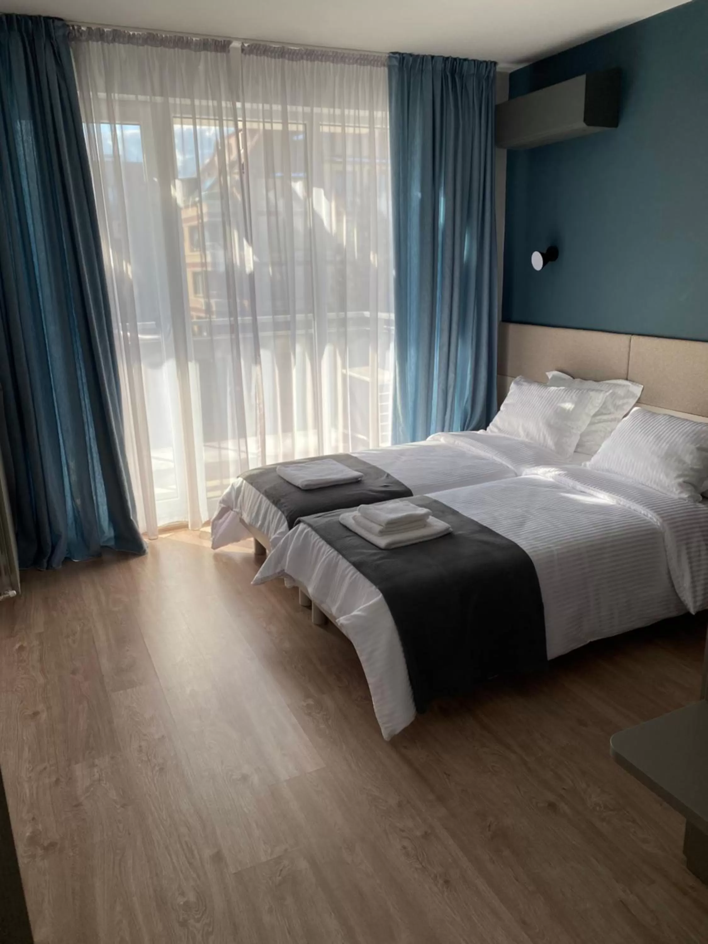 Bed in 7th Sense boutique apartments