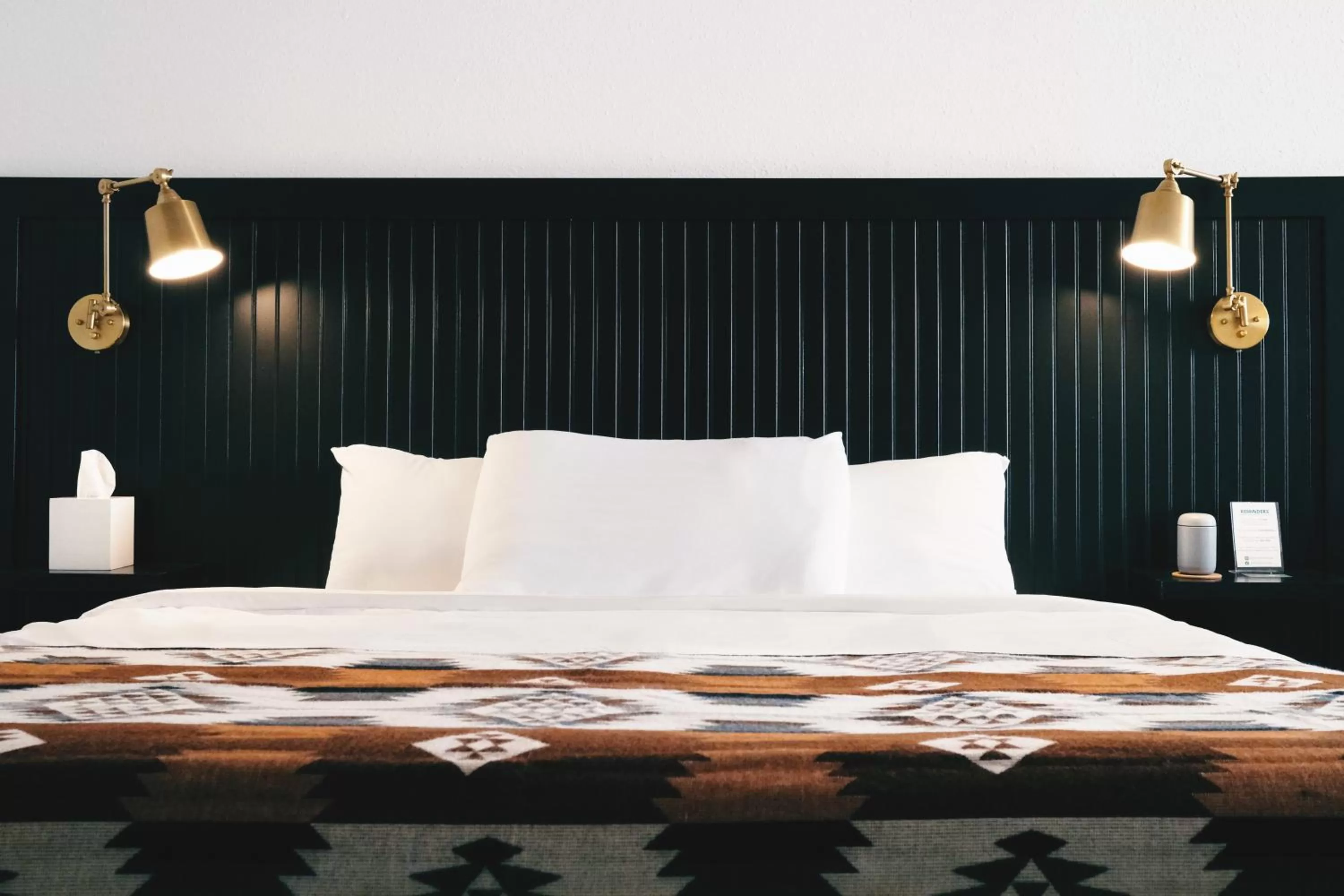 Bed in Jackalope Motor Lodge