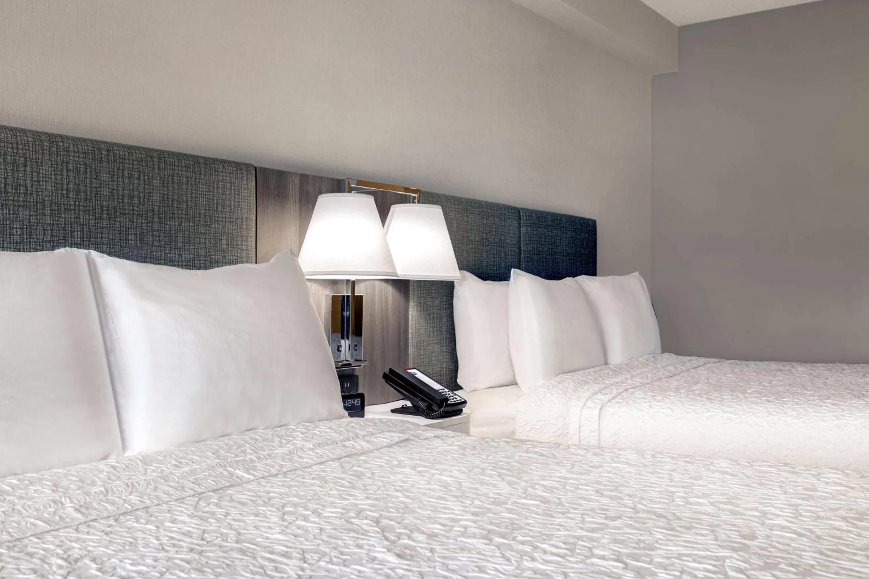 Bed in Hampton Inn & Suites Burlington, Ontario, Canada