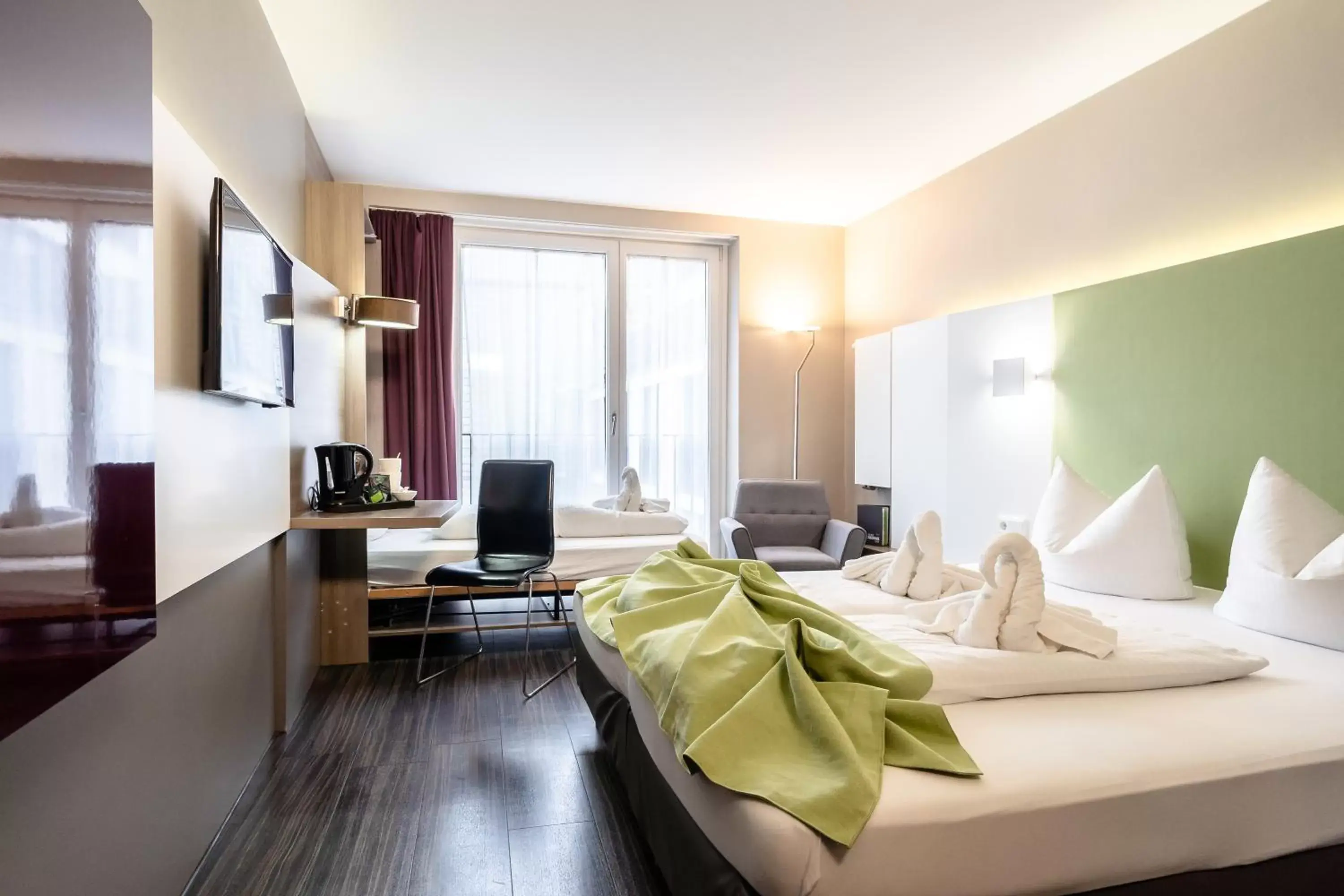 Standard Triple Room in Hotel Demas City Standard Triple Room in Hotel Demas City