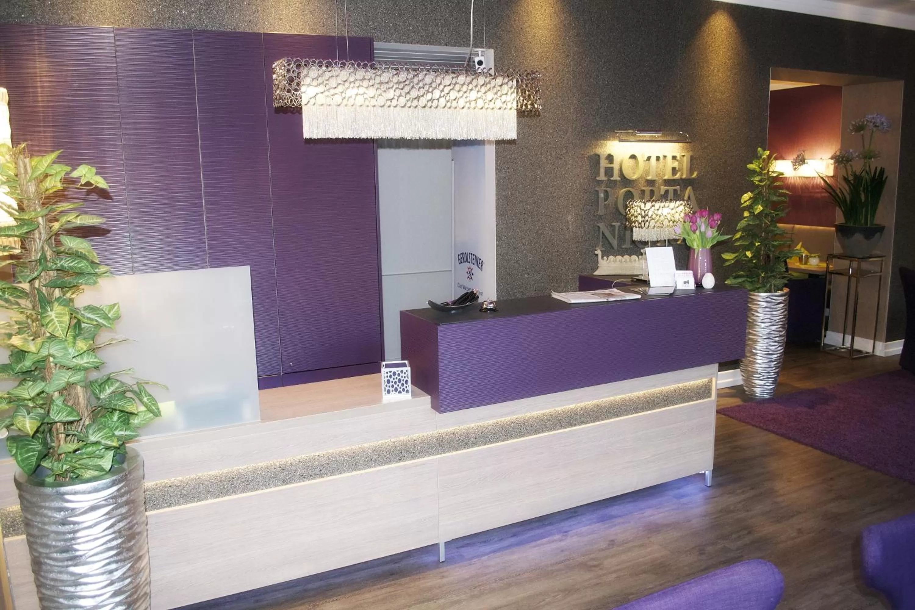 Communal lounge/ TV room in Hotel Porta Nigra