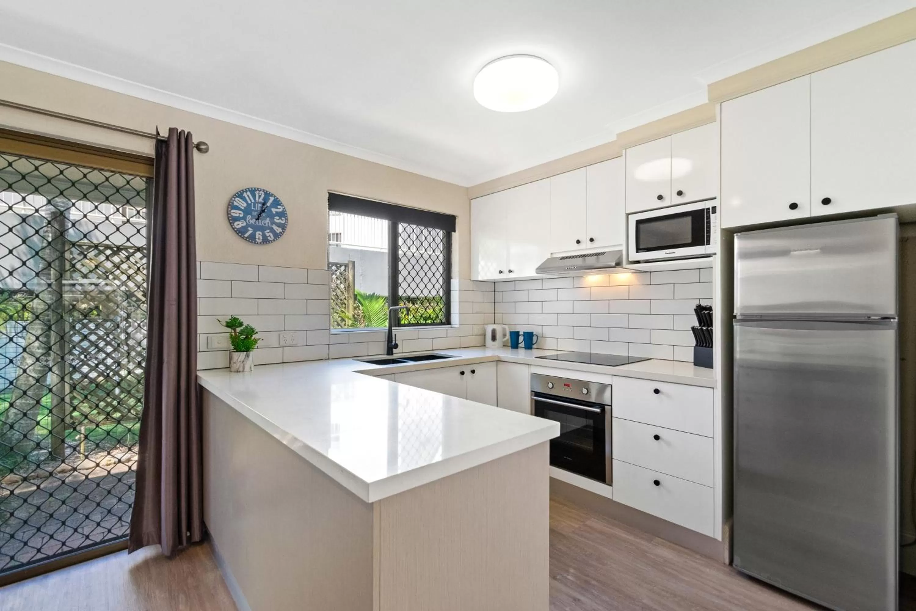 Kitchen or kitchenette in Noosa Place Resort