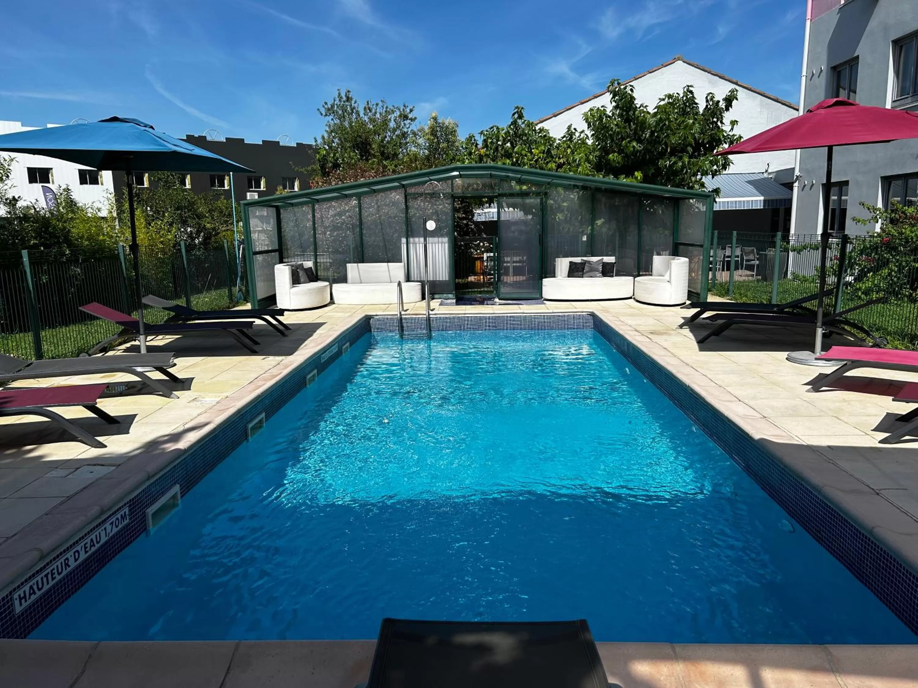 Pool view in Kyriad Montpellier Aéroport - Gare Sud de France