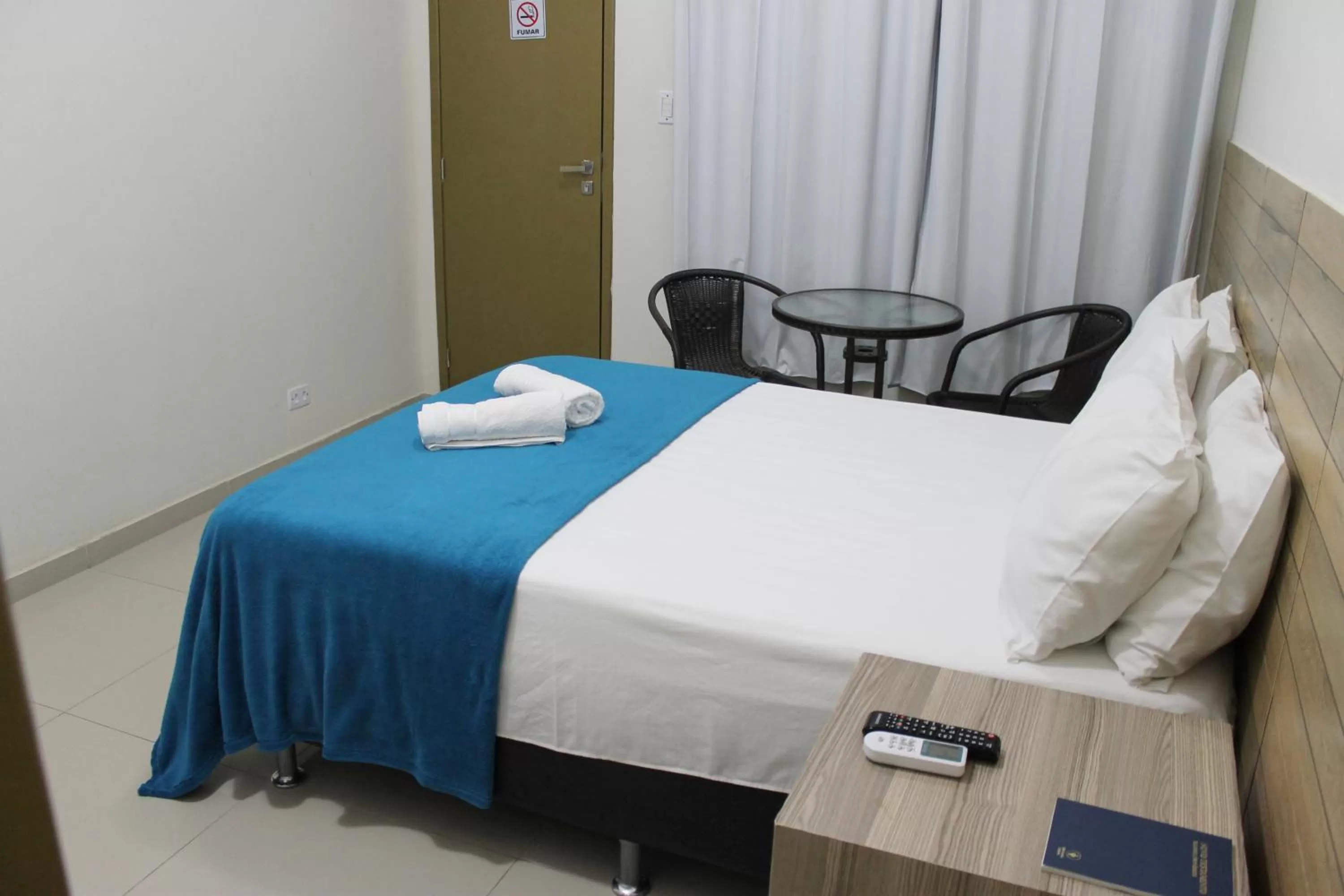 Bed in Pousada Das Palmeiras