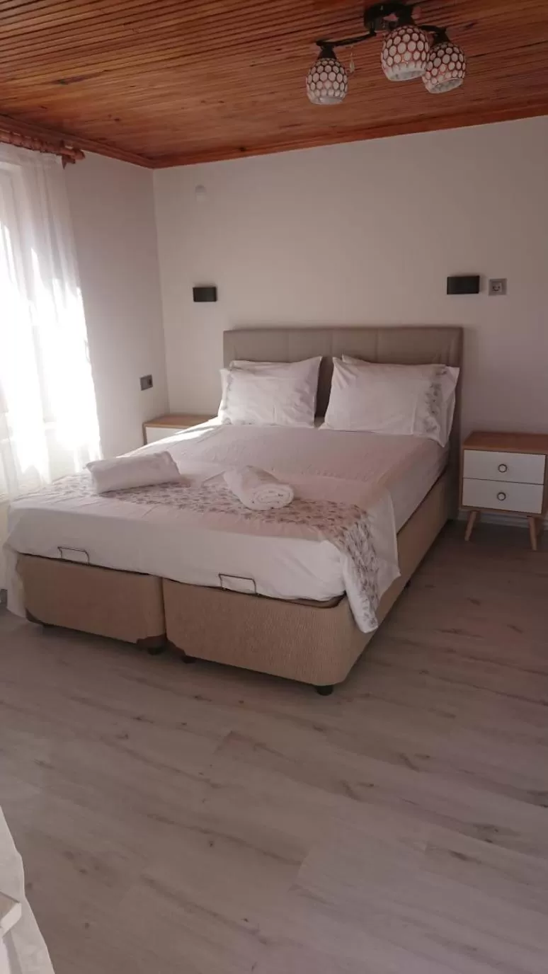 Day, Bed in Ali's Pension