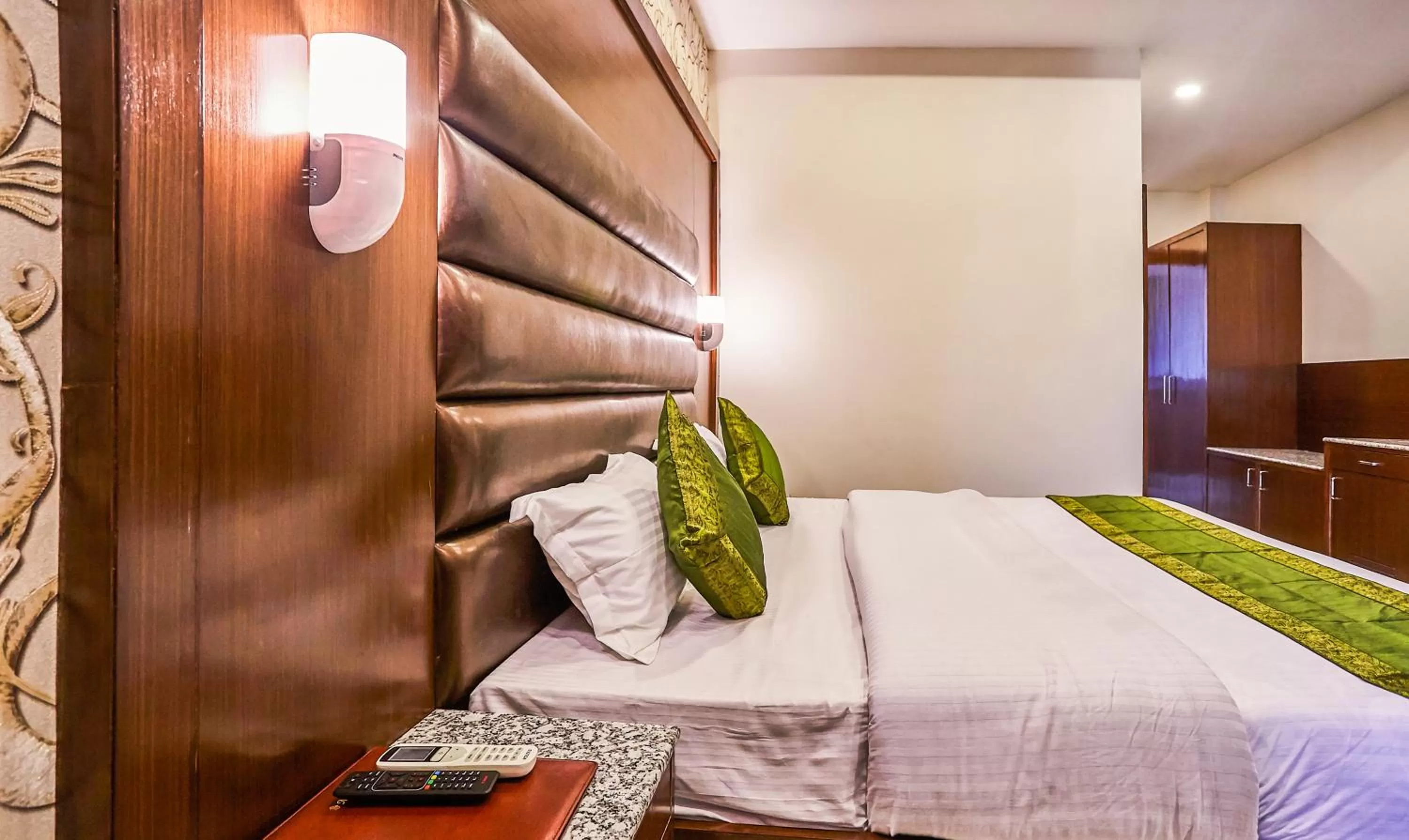 Bedroom, Bed in Treebo Grand Legacy Elite With Roof Top Cafe