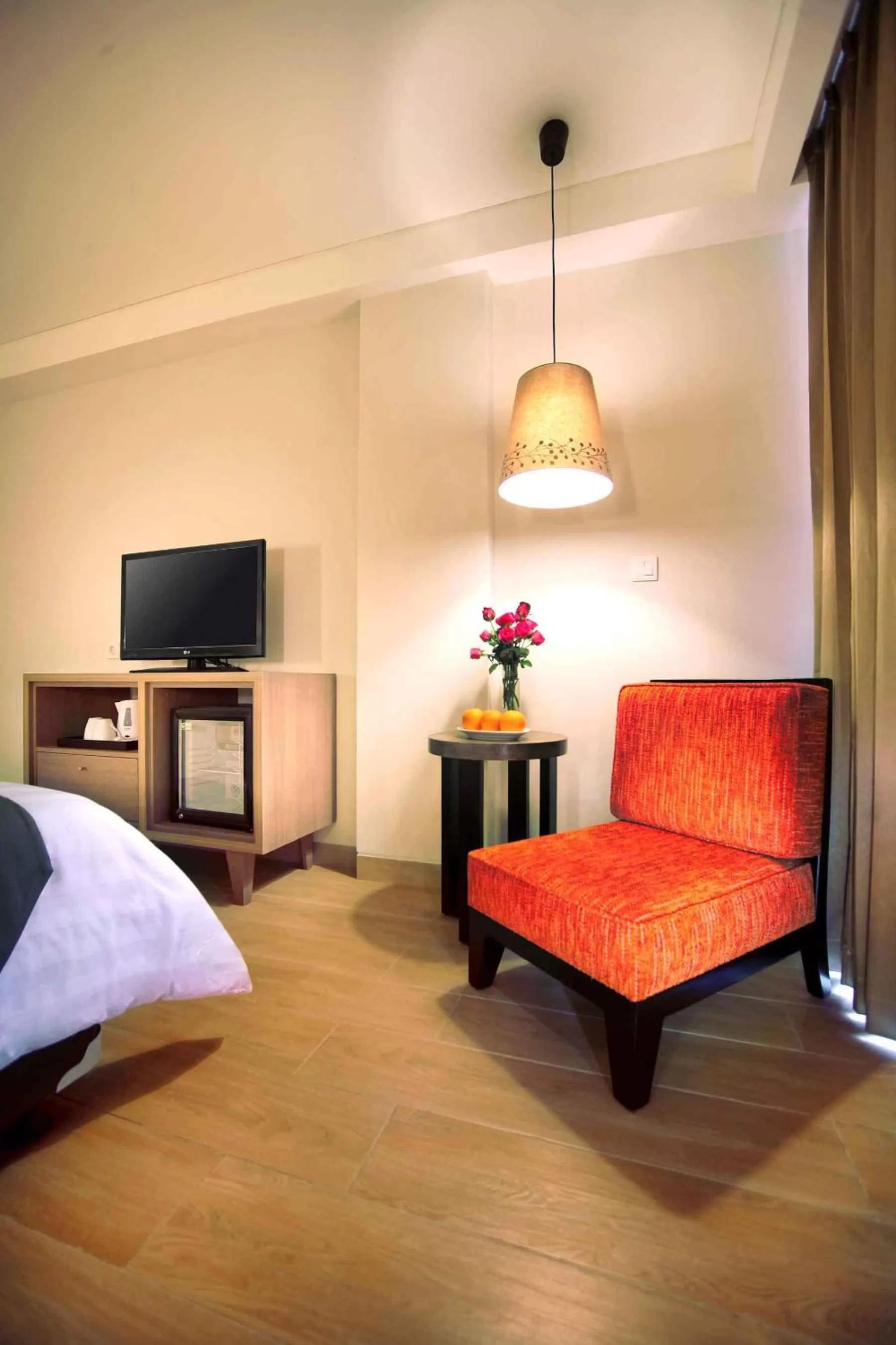 Seating area, Bed in Harper Kuta Hotel by ASTON