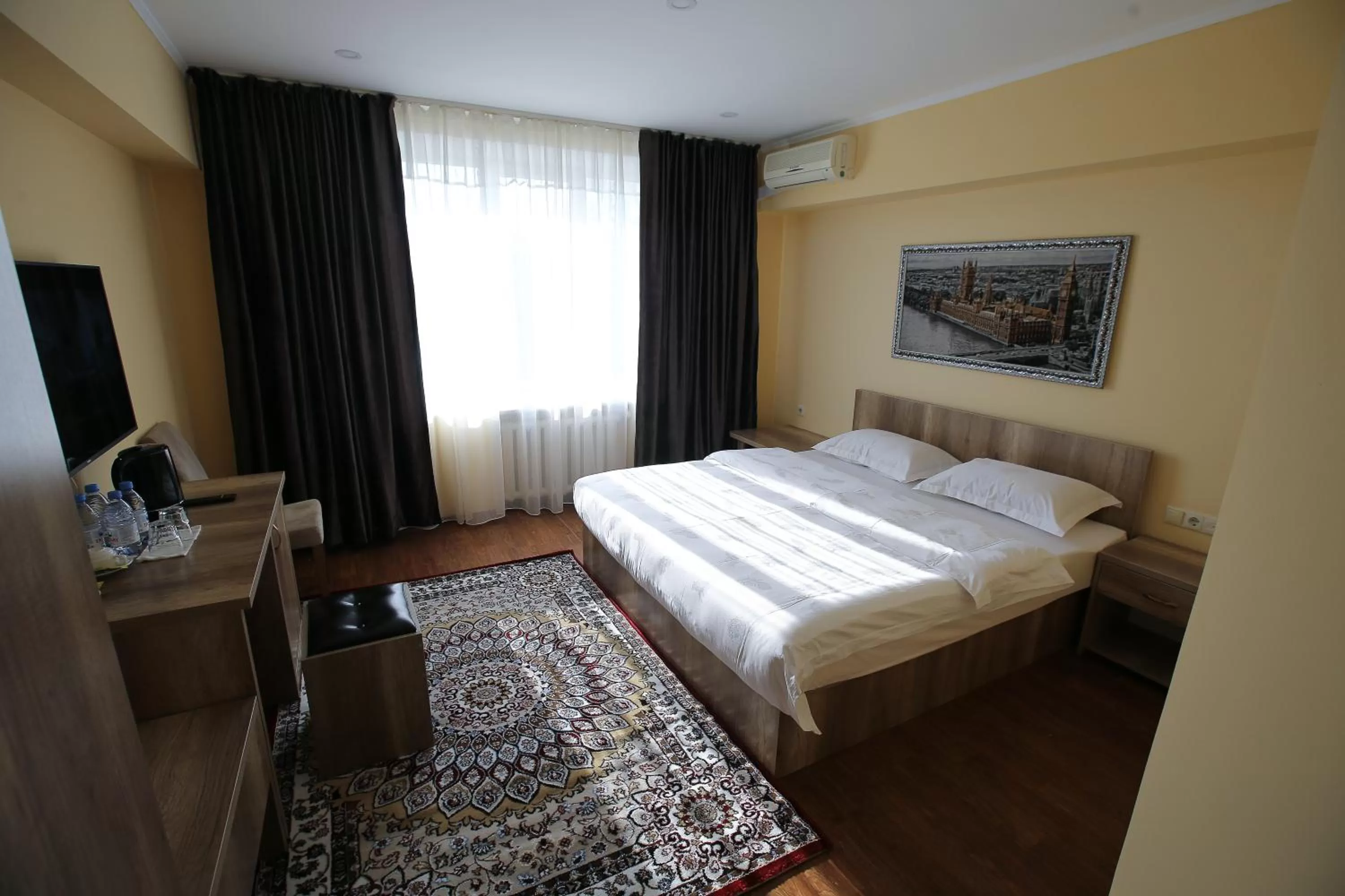 Bed in Altai Business Hotel