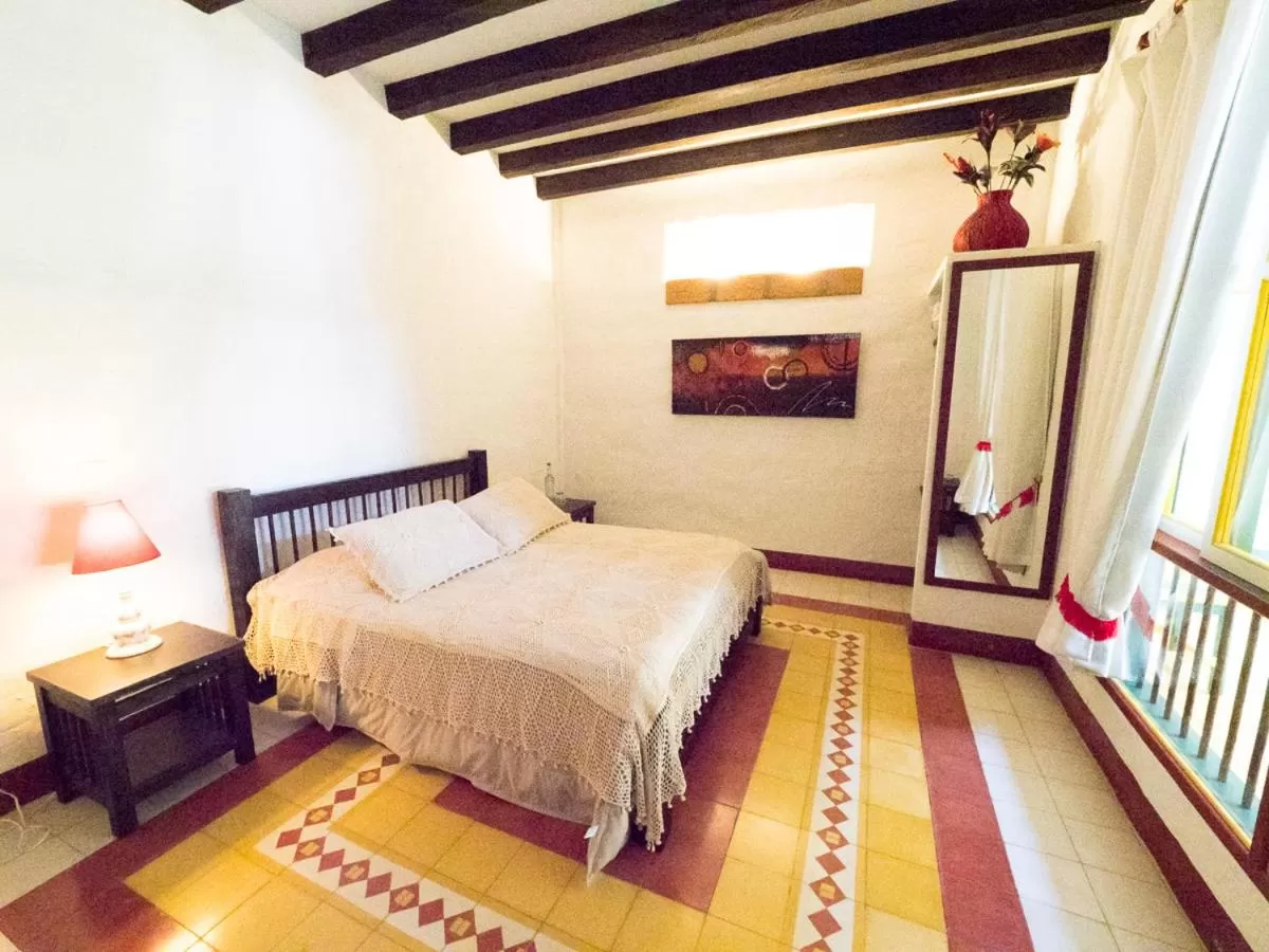 Bed in El Despertar Hotel