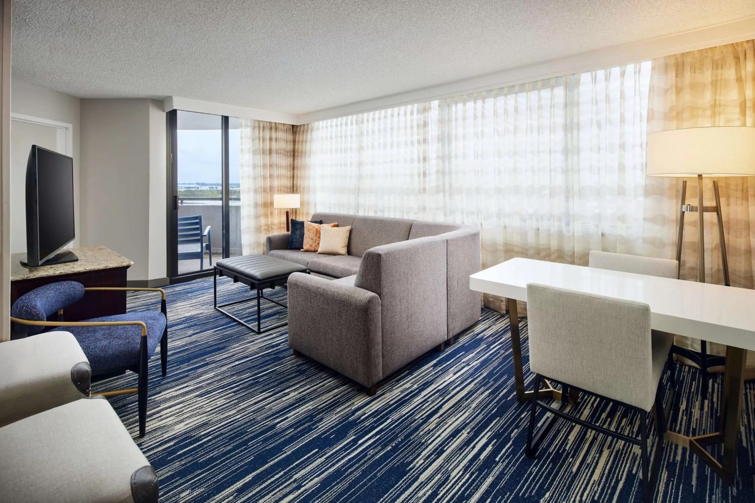 Living room in Embassy Suites by Hilton West Palm Beach Central