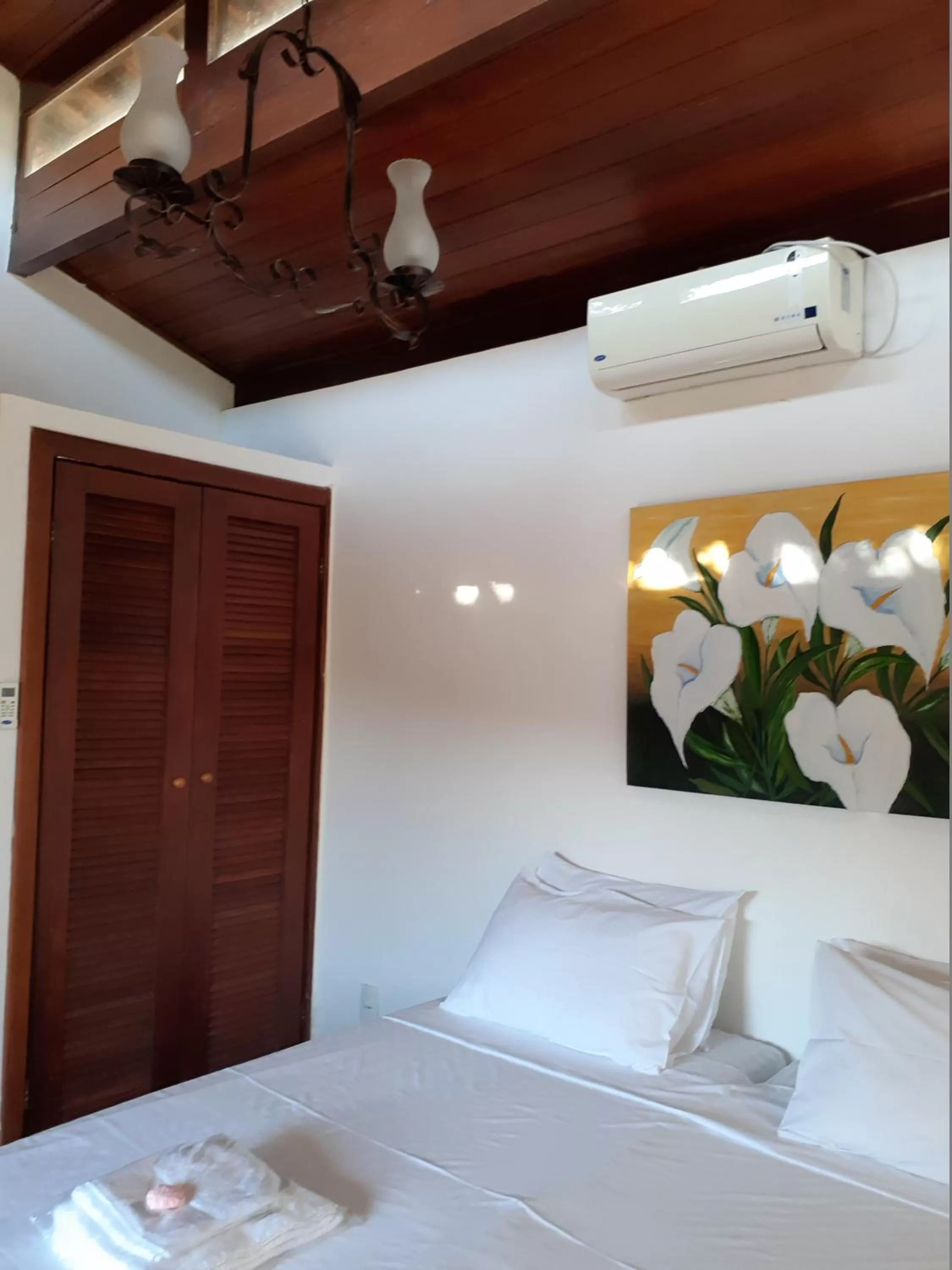 Bed in Pousada R.N.C. Nosso Paraíso