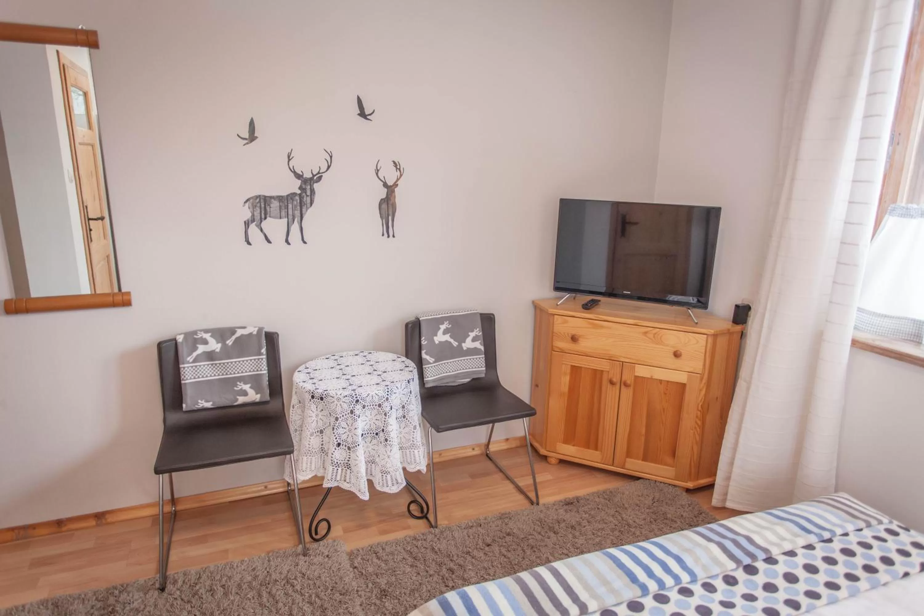 Photo of the whole room, TV/Entertainment Center in Gościniec i Herbaciarnia Pod Złotą Łyżwą