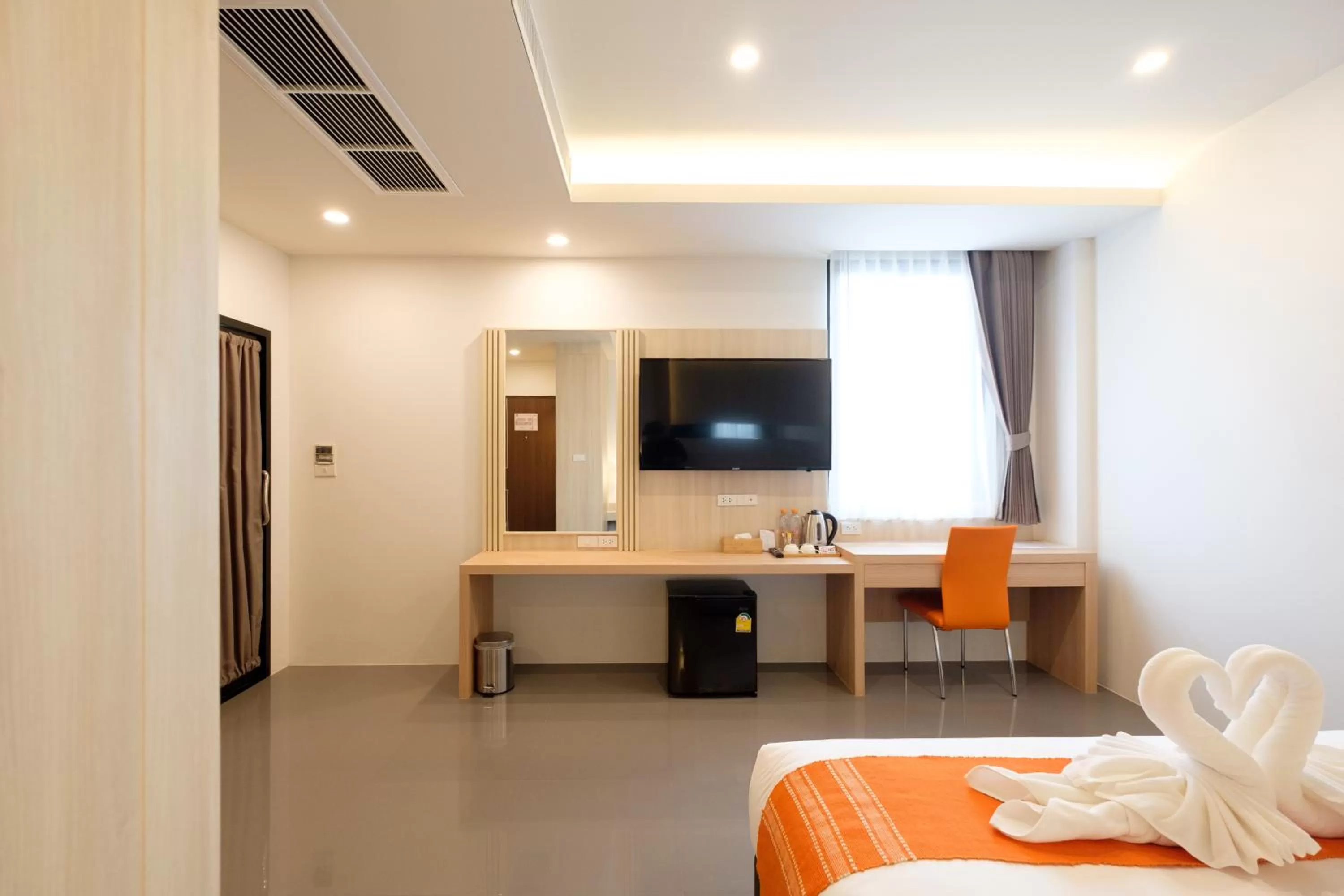 Bed, TV/Entertainment Center in Monte Maesot hotel