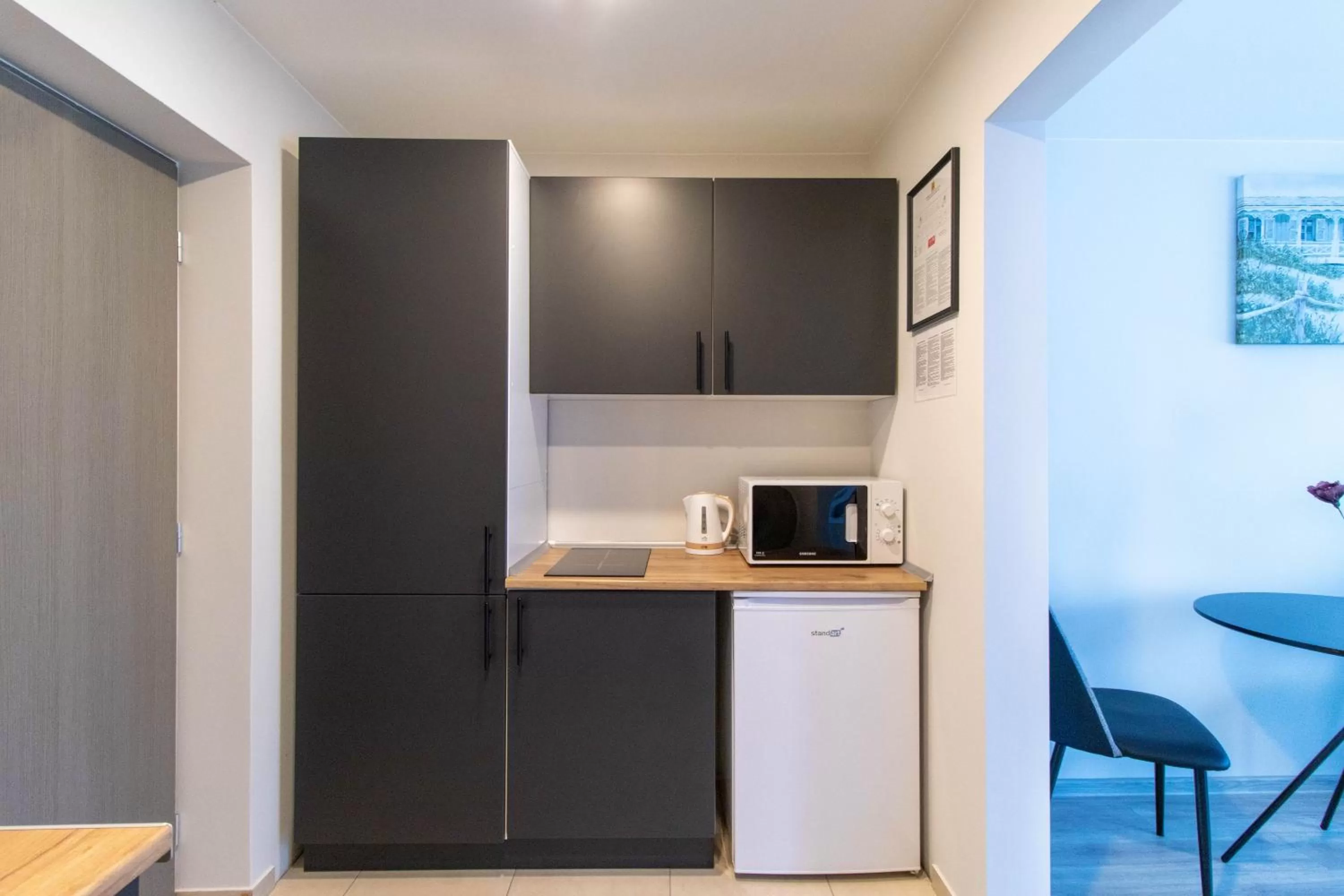 Kitchen/Kitchenette in Dzukija Hotel