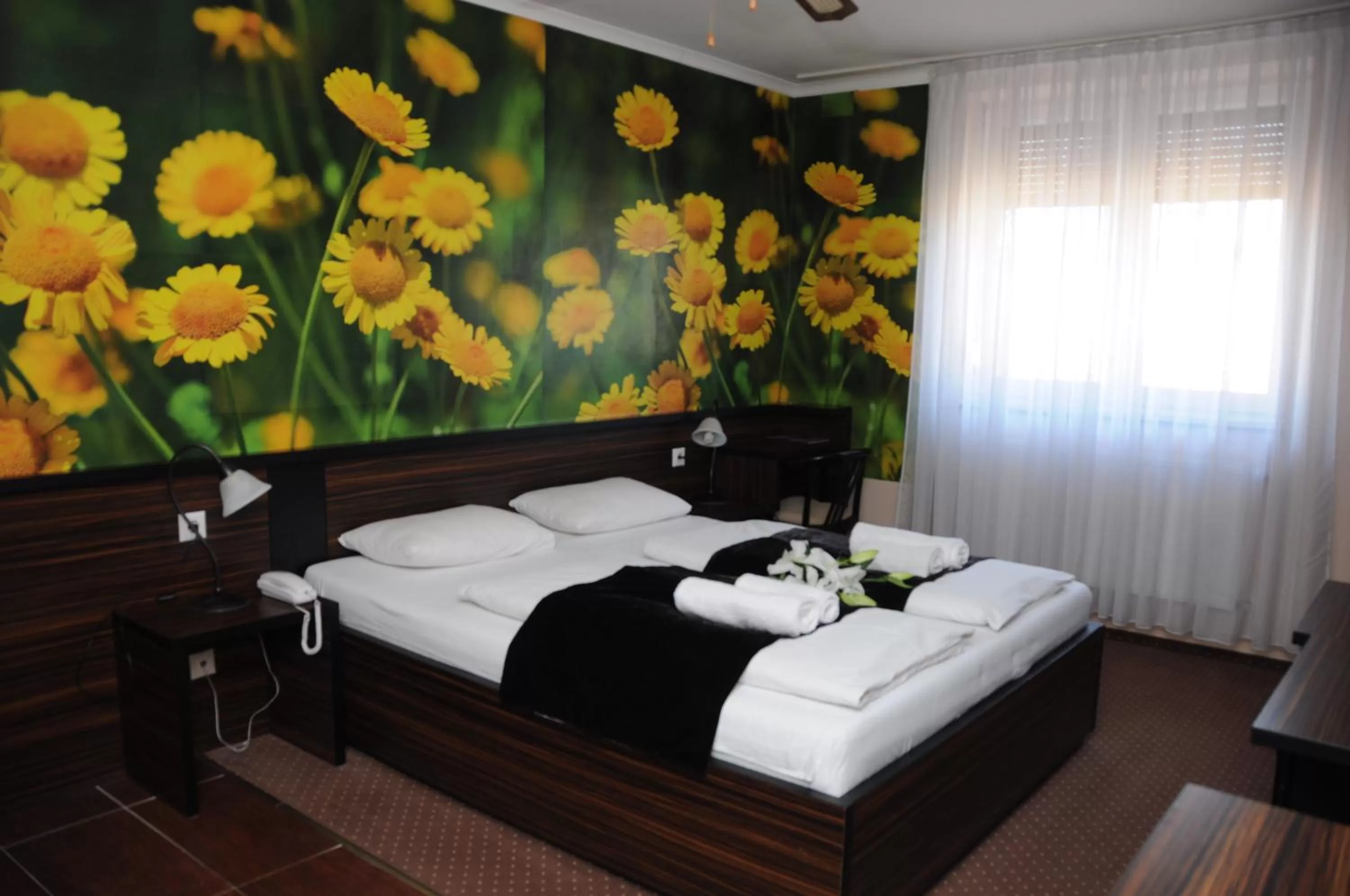 Bed in Green Hotel Budapest