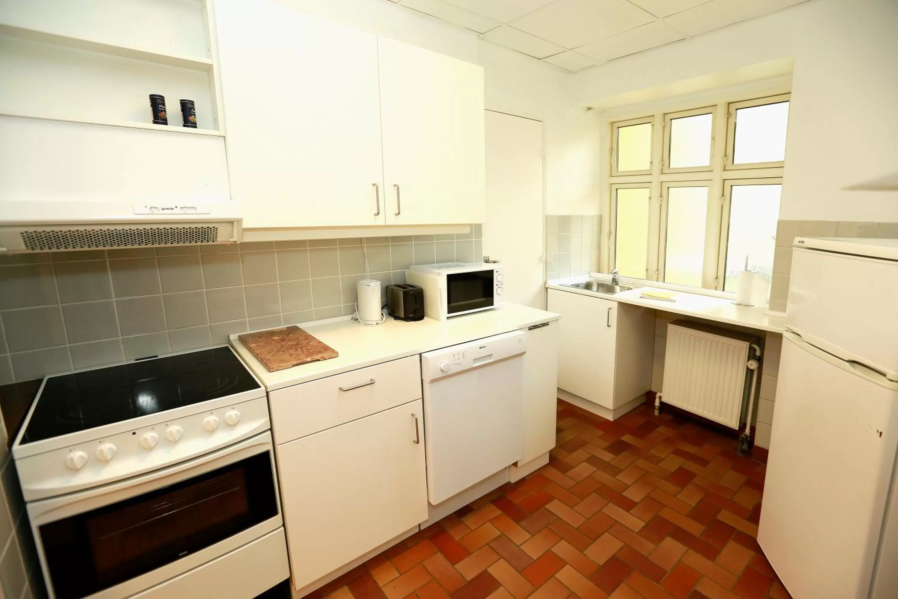 Kitchen or kitchenette in Hotel 9 små hjem