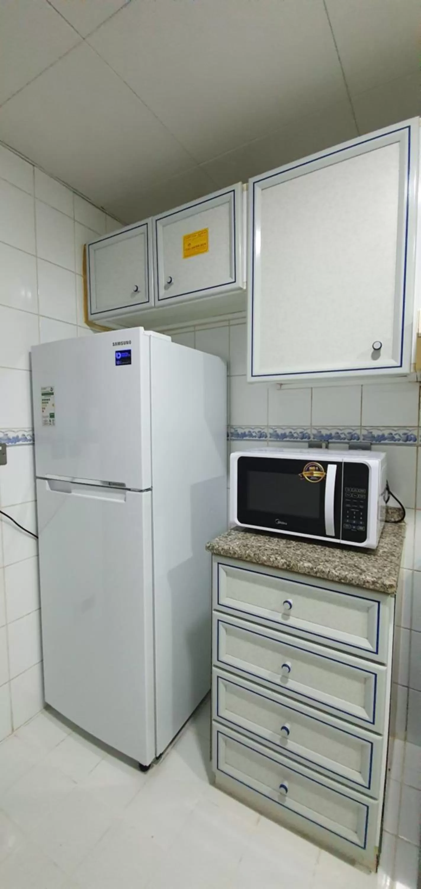 Kitchen or kitchenette in Ivory Hotel Apartments