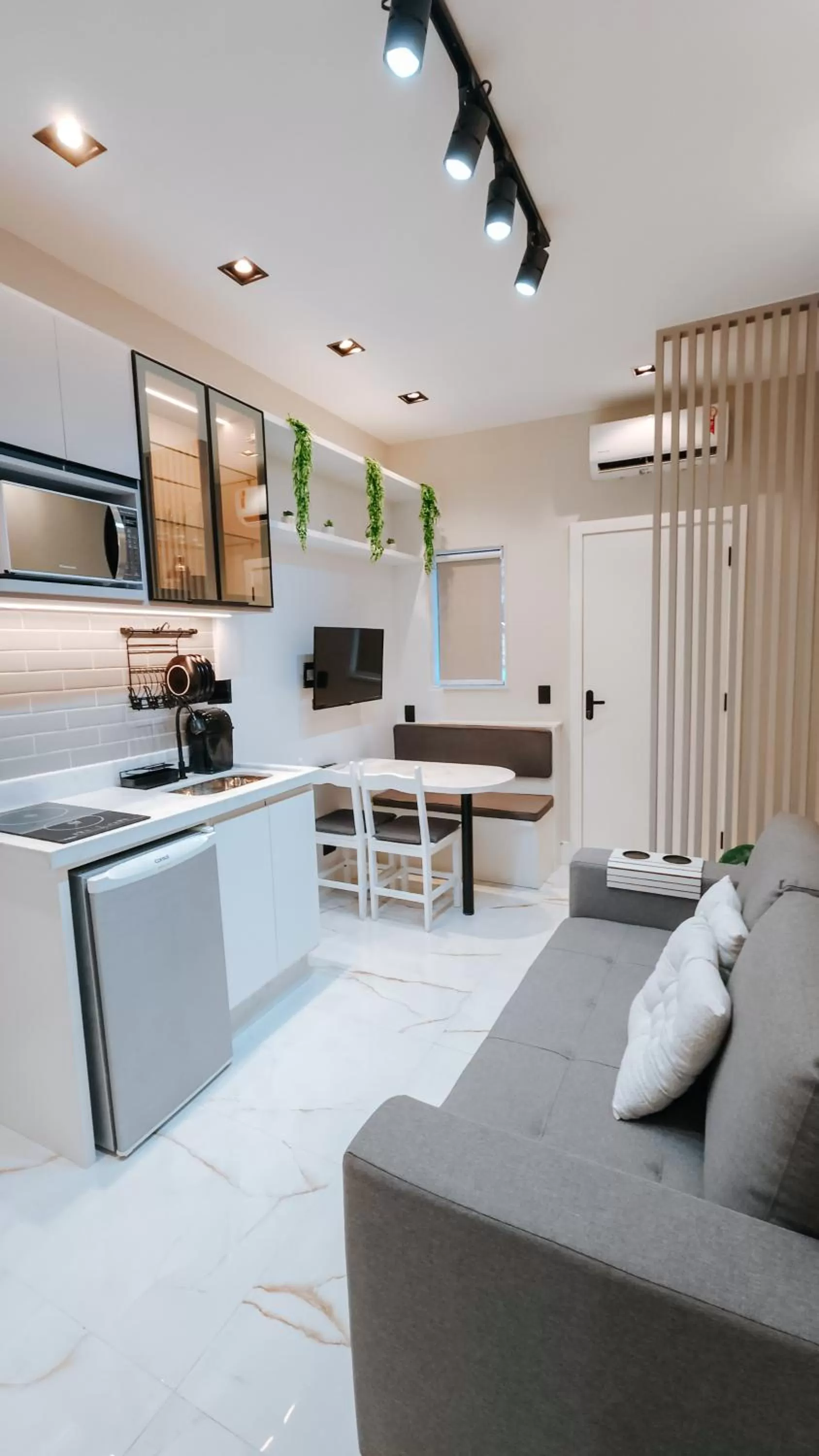 Kitchen or kitchenette in Suítes Água Marinha