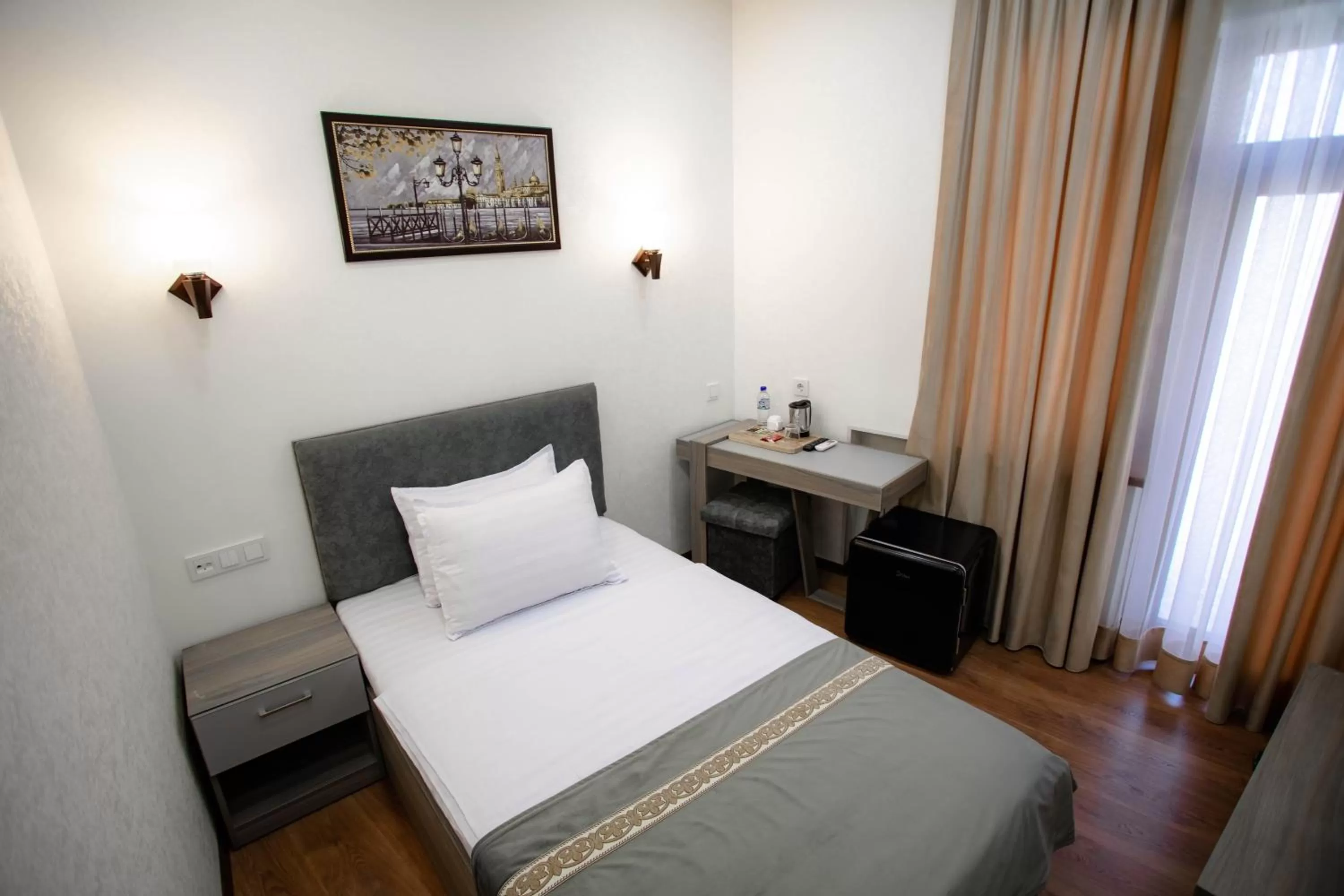 Bed in Registon Saroy Hotel