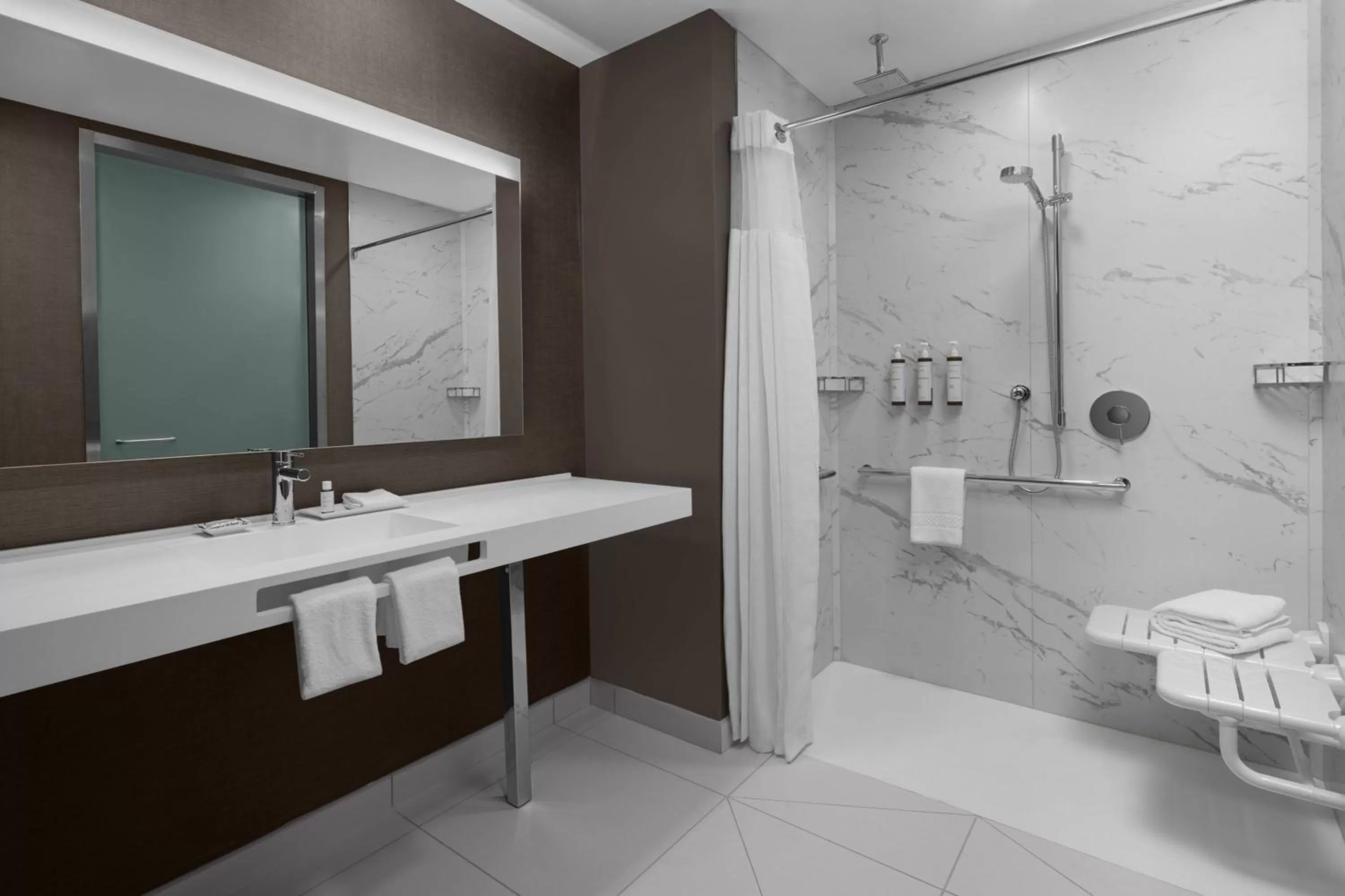 Bathroom in AC Hotel by Marriott Charlotte Ballantyne