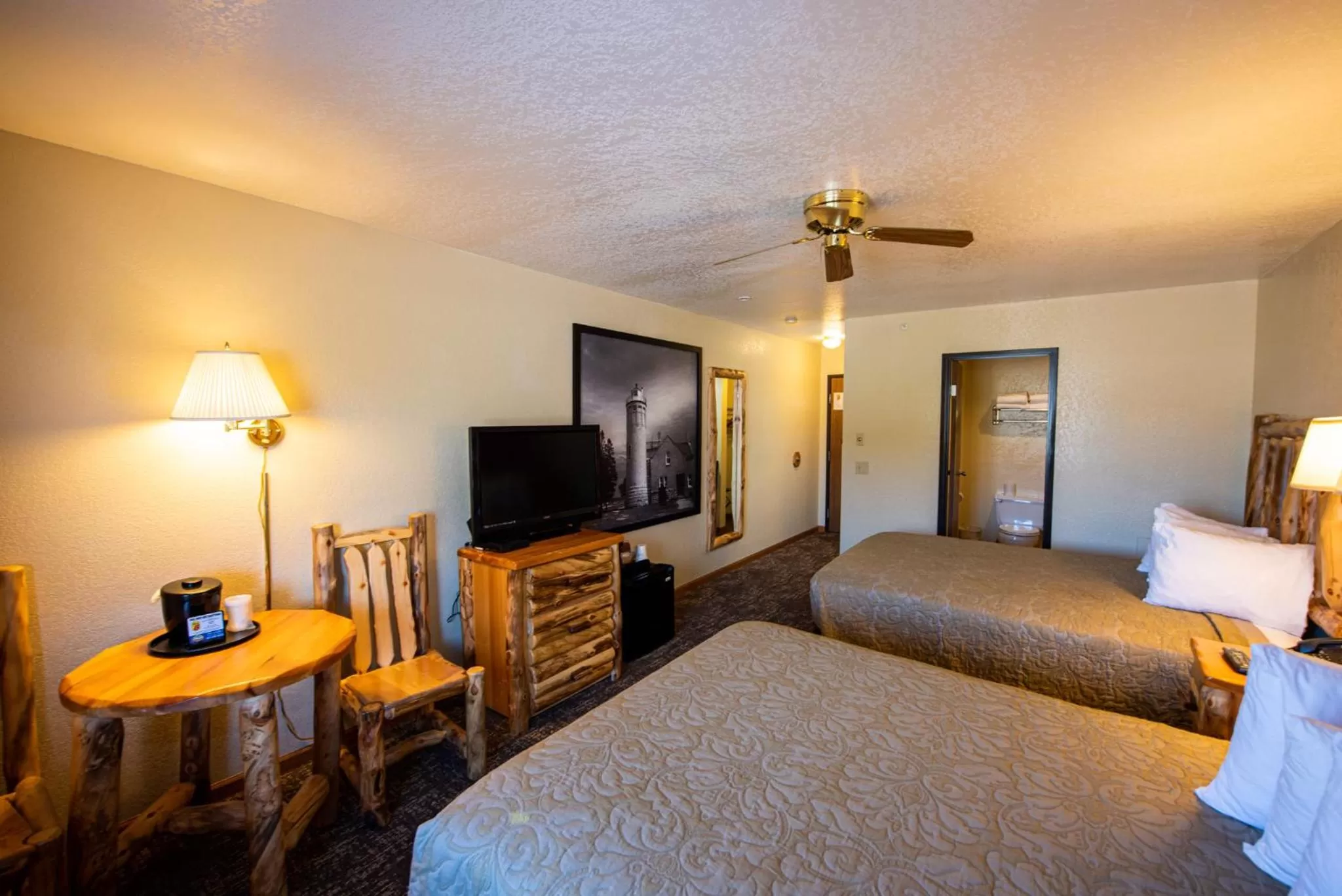 Bed in Super 8 by Wyndham Bridgeview of Mackinaw City
