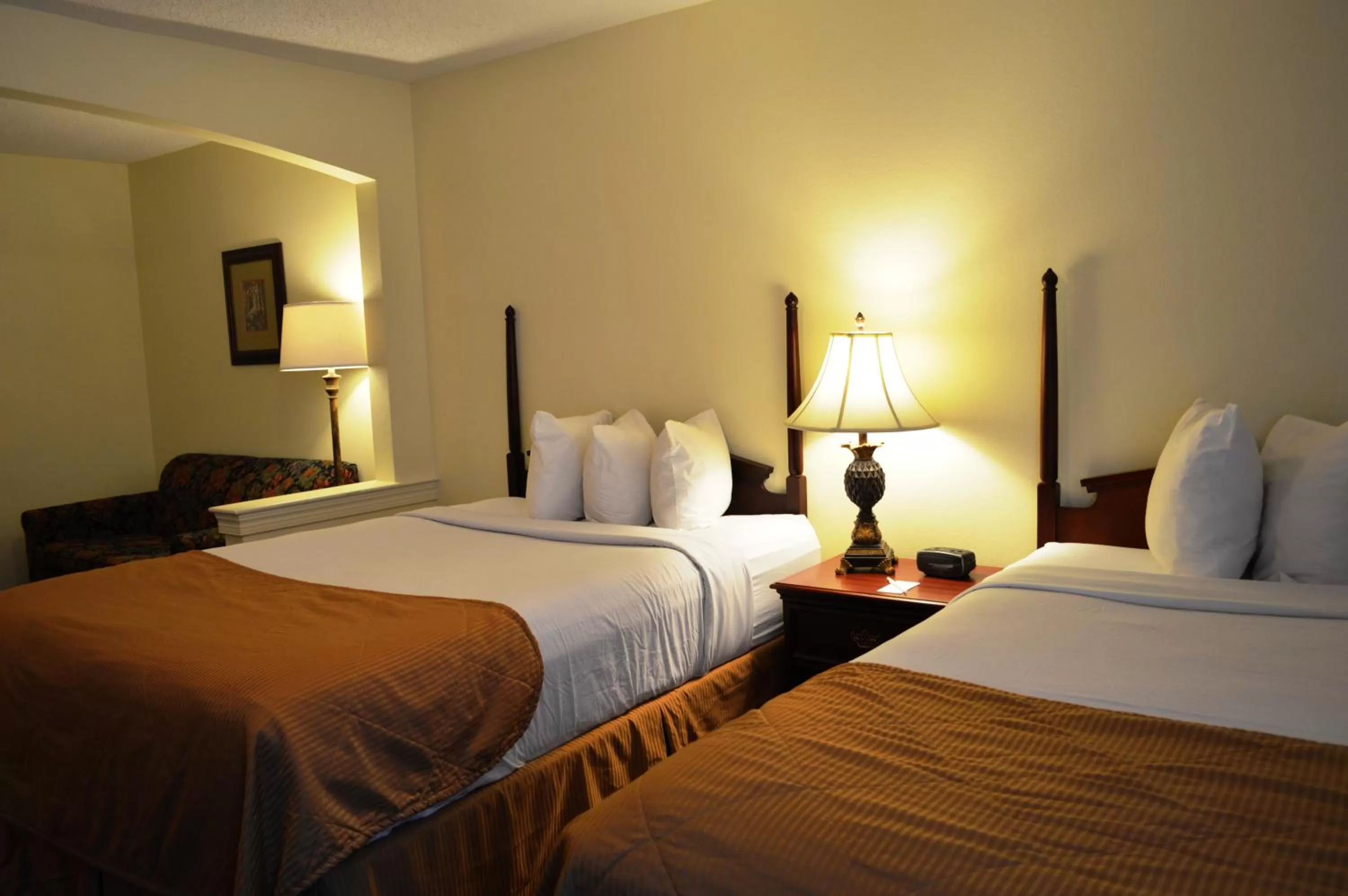 Bed in Opal Hotel & Suites