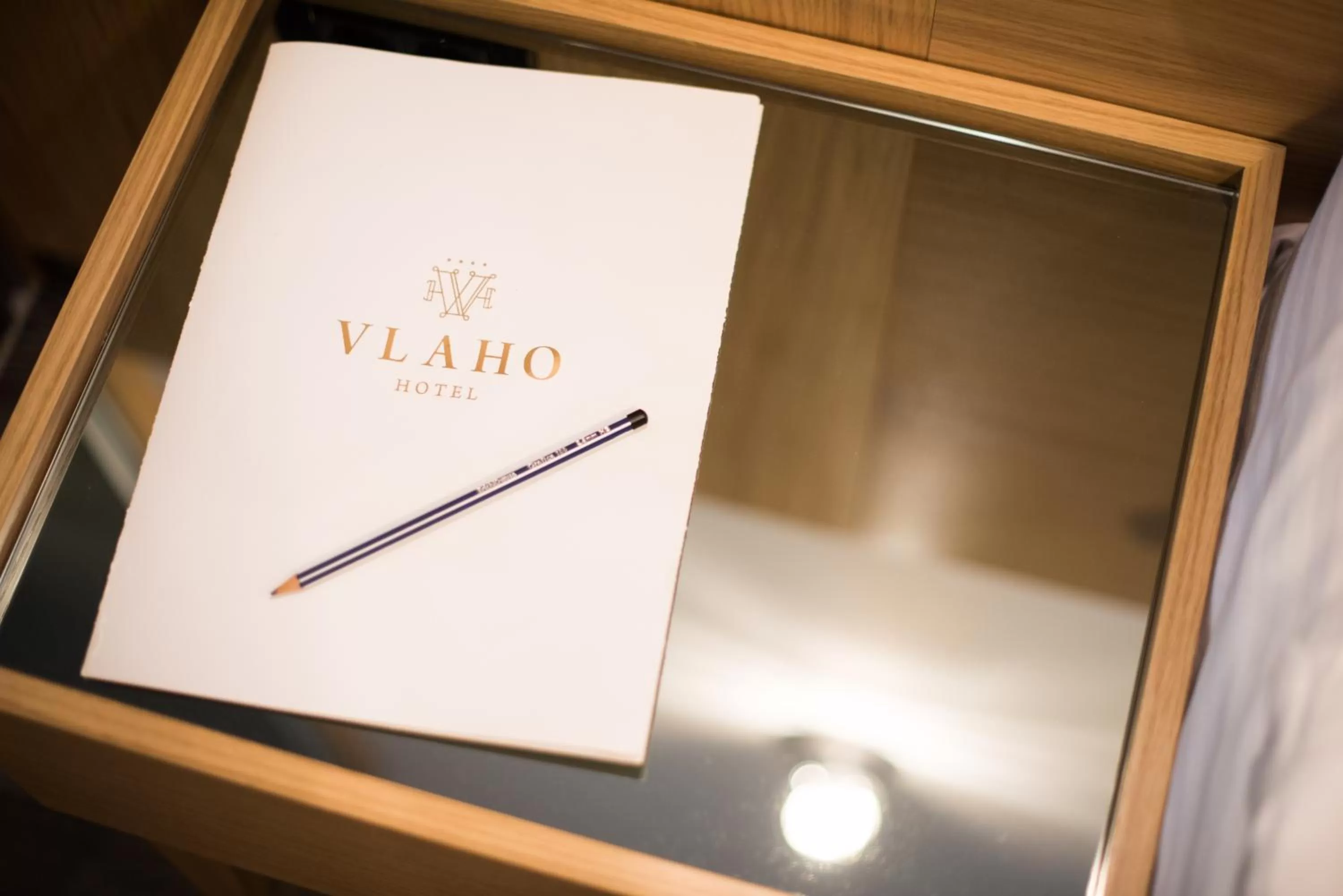 Logo/Certificate/Sign in Hotel Vlaho