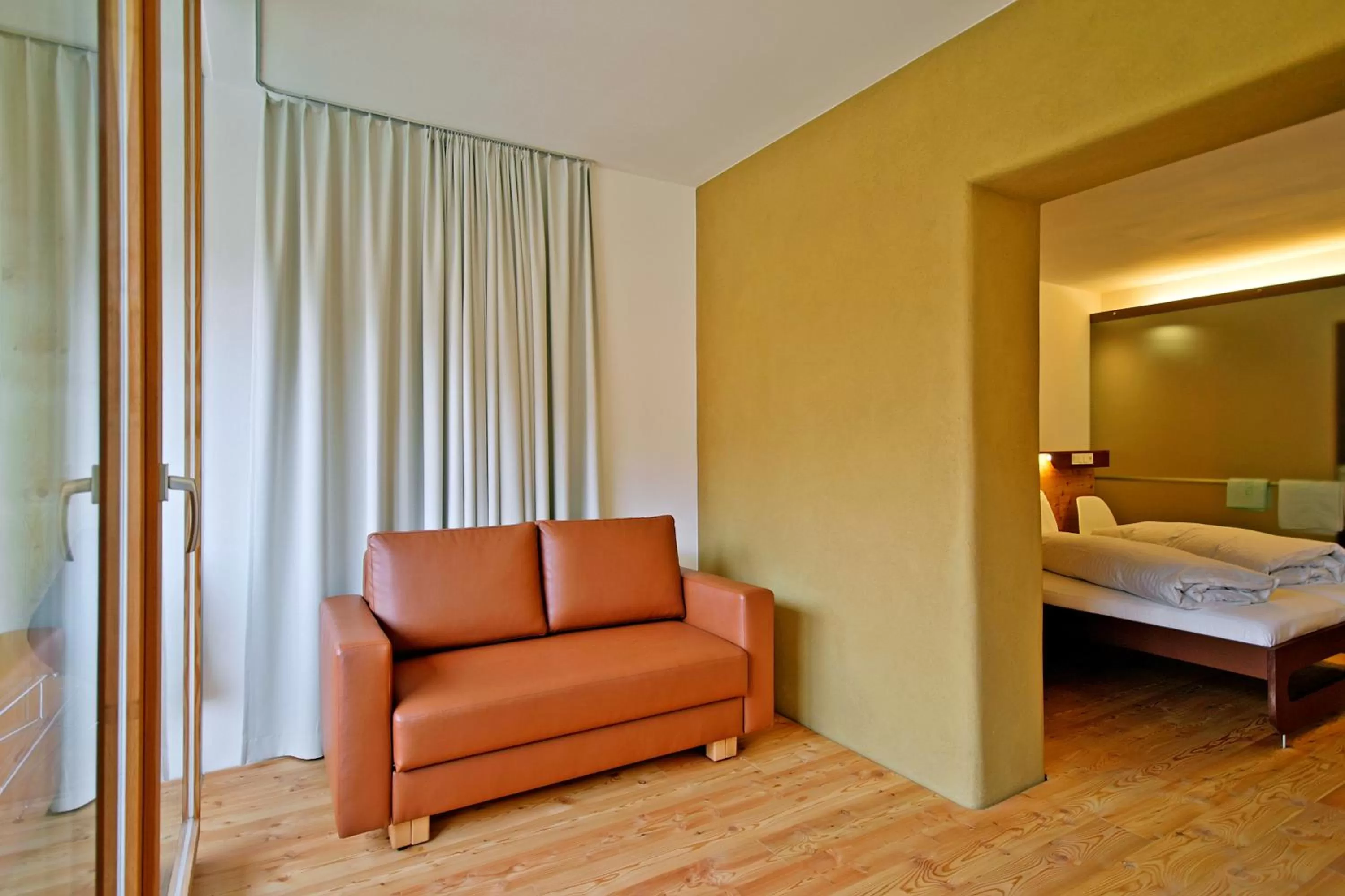 Seating area, Bed in Hotel Hinteregger