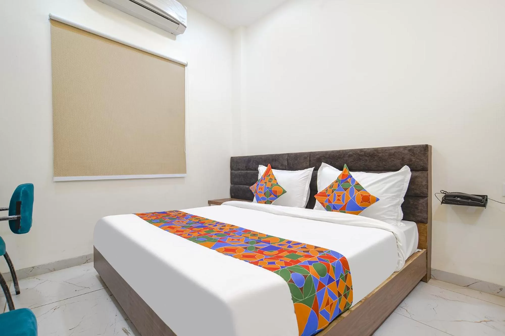 Bed in FabHotel Ramya