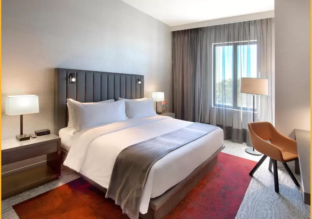 King Bed Room - Hearing Accessible in THesis Hotel Miami Coral Gables, Curio Collection by Hilton King Bed Room - Hearing Accessible in THesis Hotel Miami Coral Gables, Curio Collection by Hilton