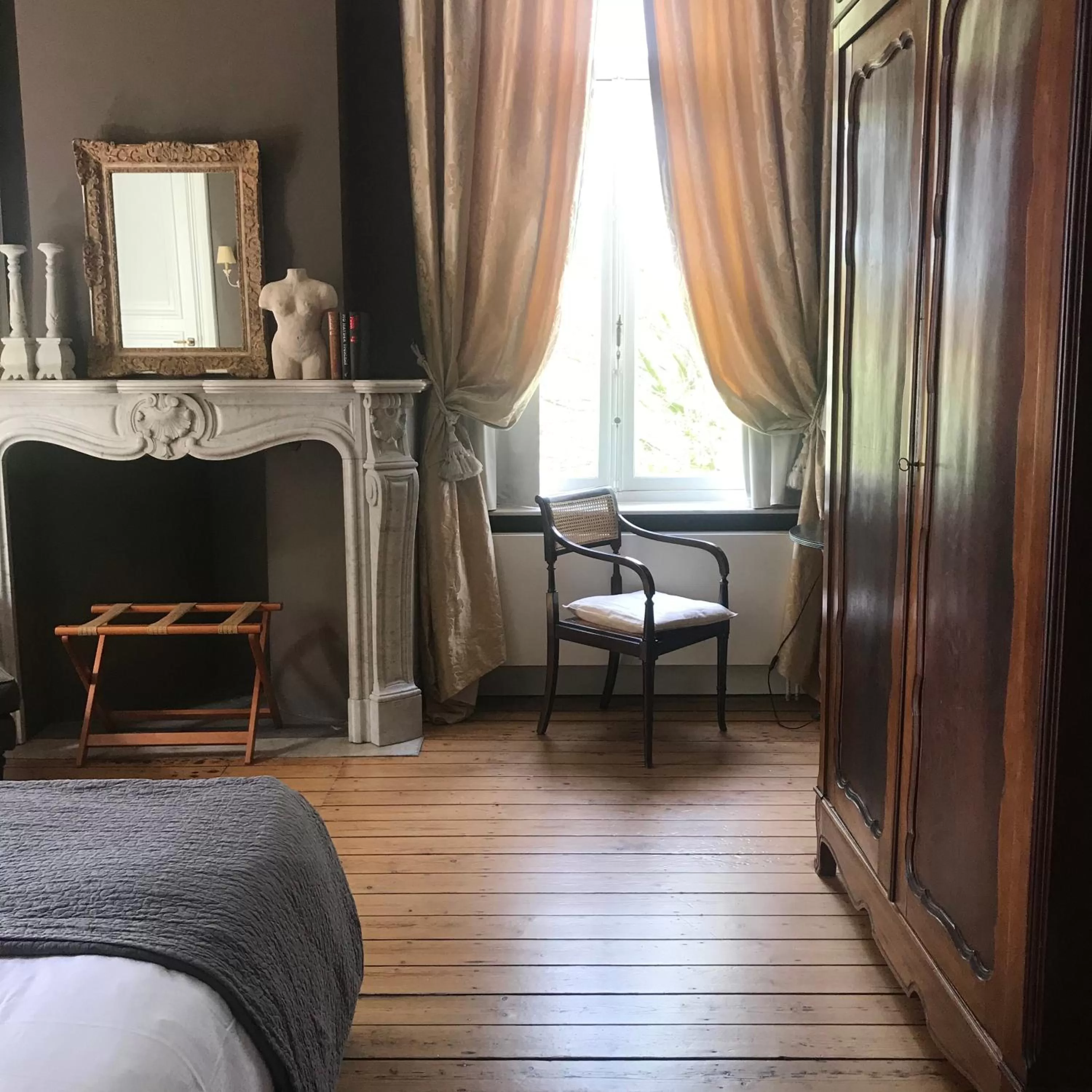 Bed, Seating Area in B&B 't Kasteel & 't Koetshuys