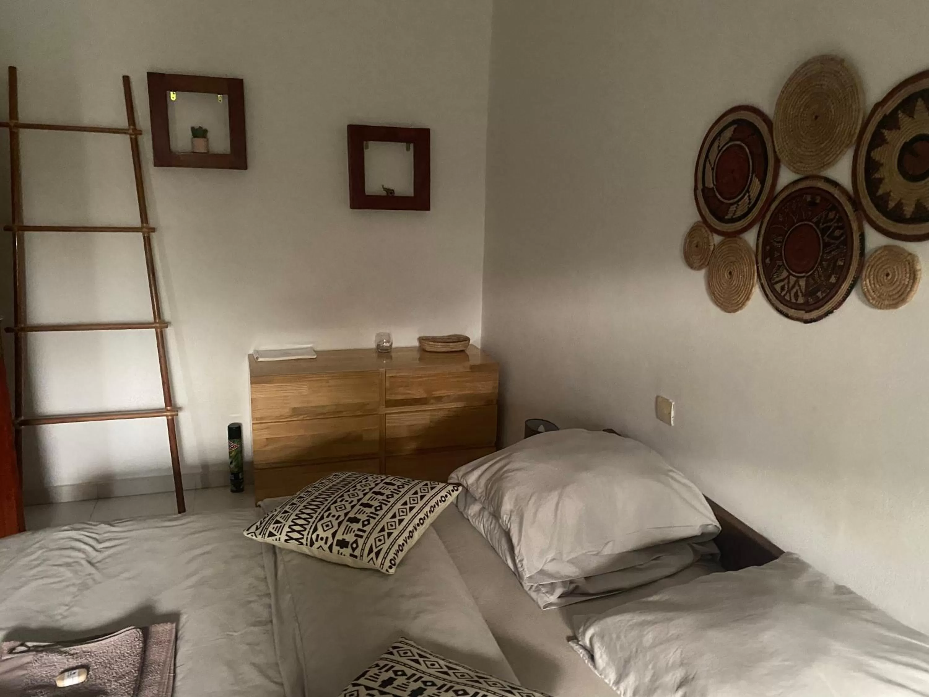 Bed in L'Oasis Guesthouse