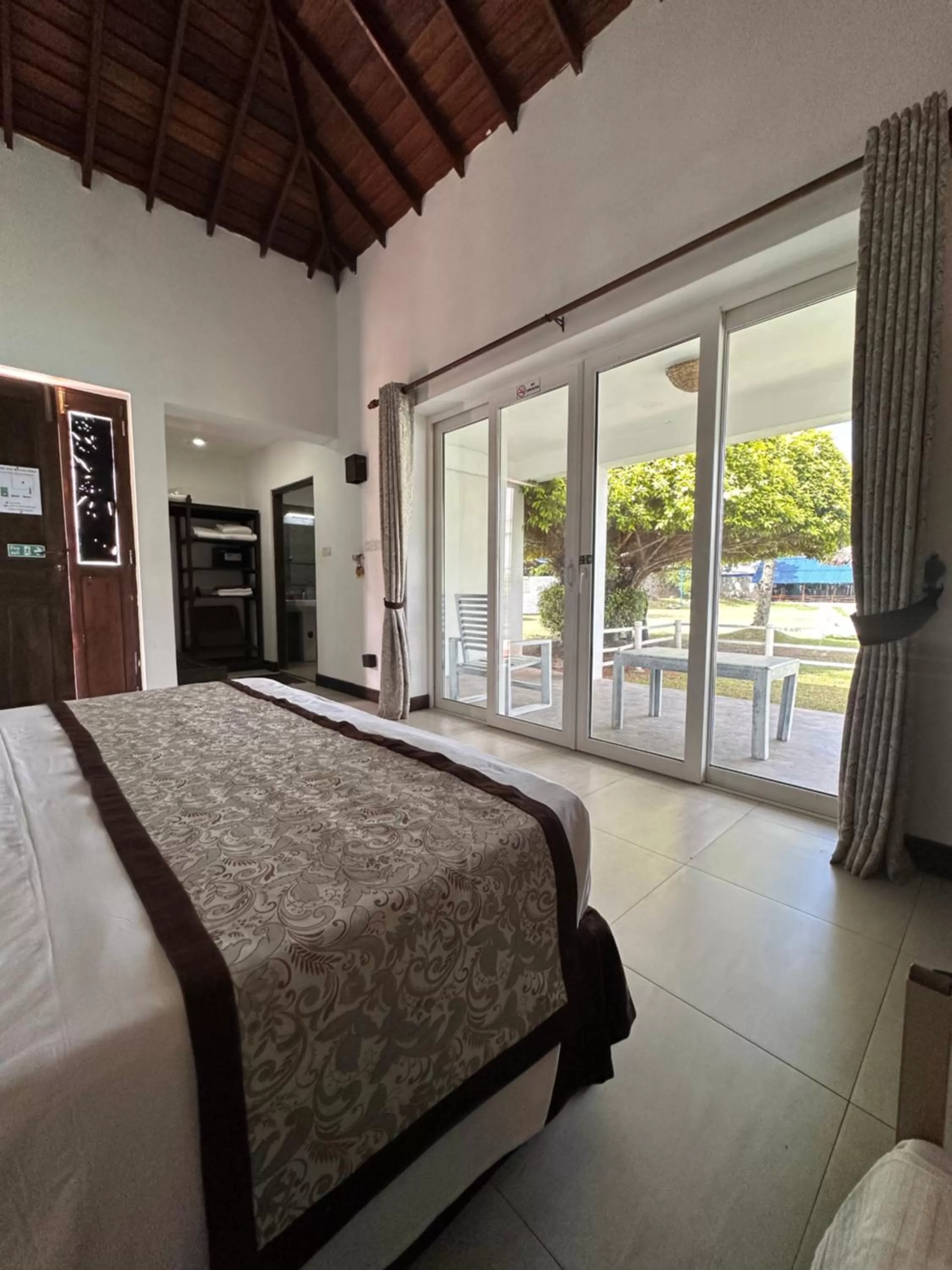 View (from property/room), Bed in Amaluna Resorts