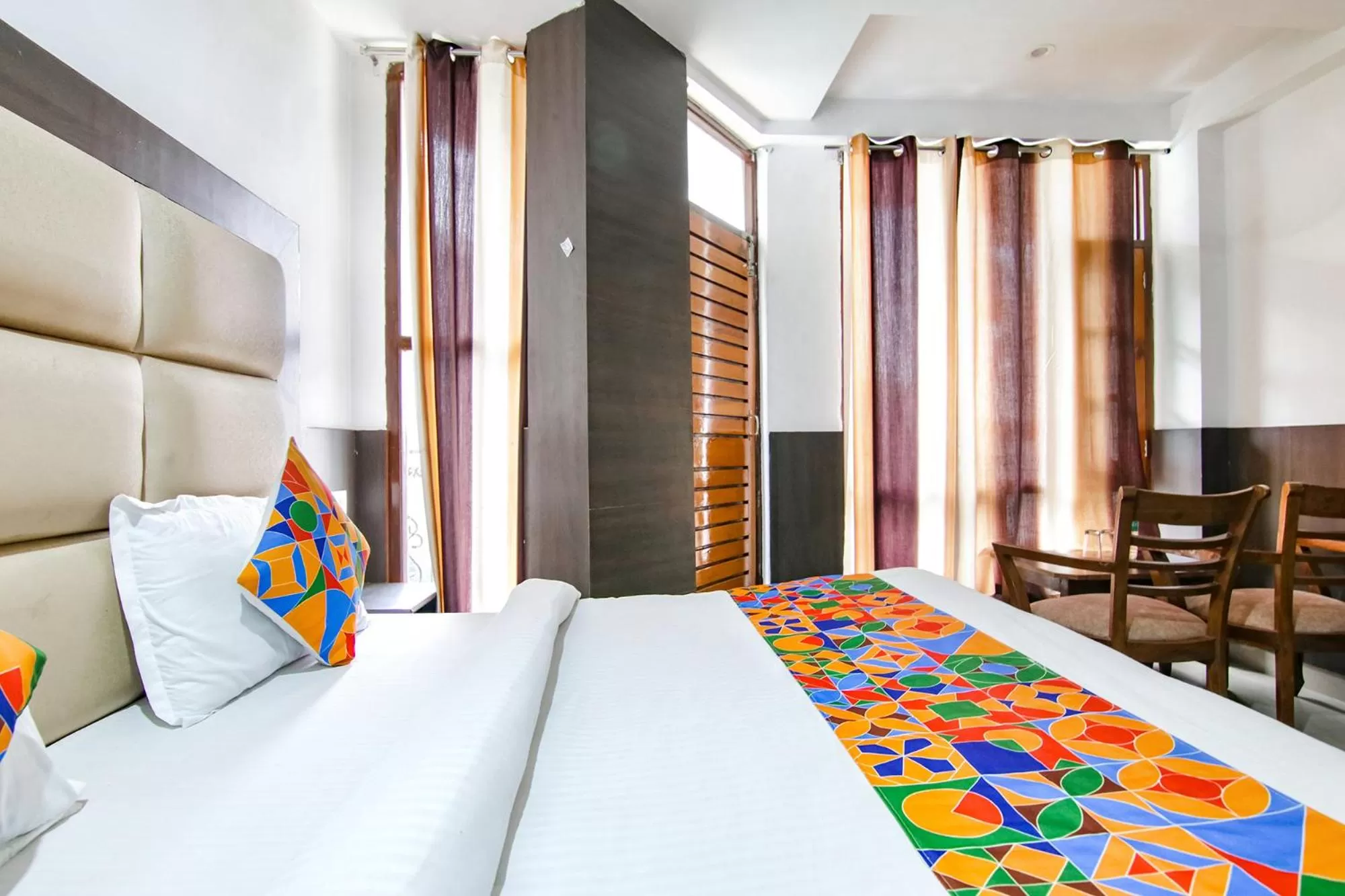 Bed in FabHotel Rosewood Inn I