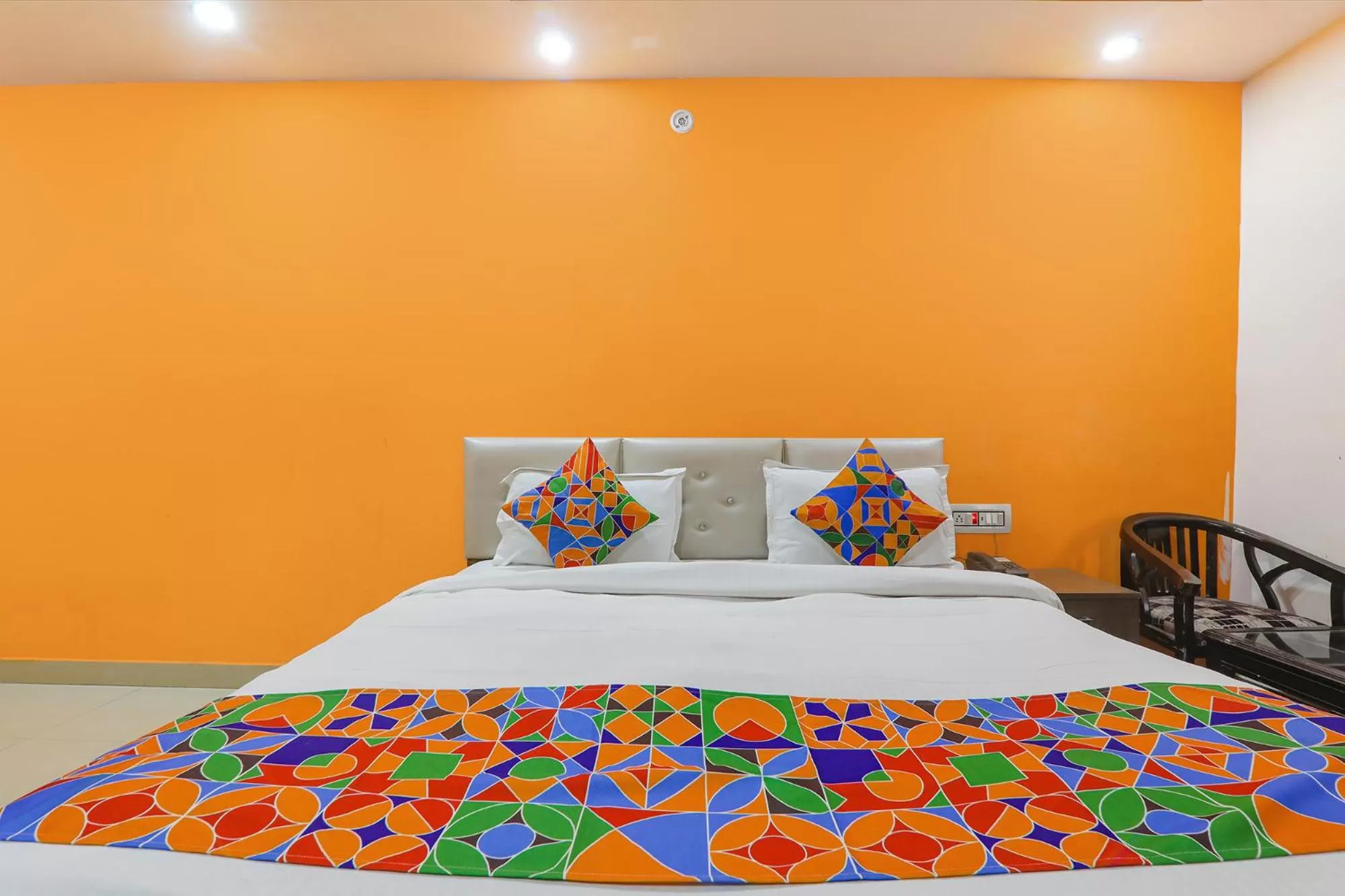 Bed in FabHotel Vinayaka