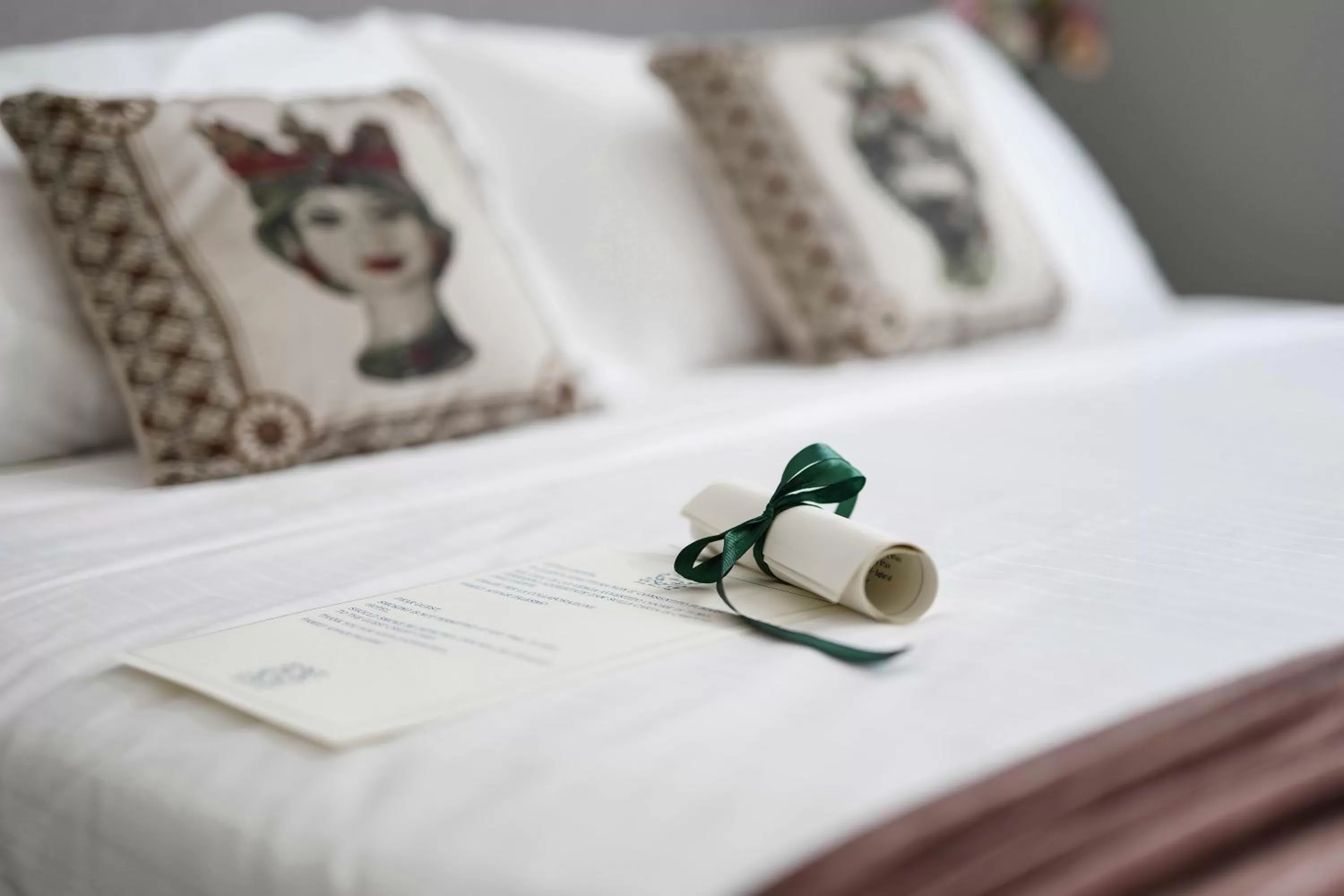 Bed in Family Affair Luxury Rooms&Suites